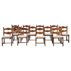 Set of 12 brutalist razorback dining chairs