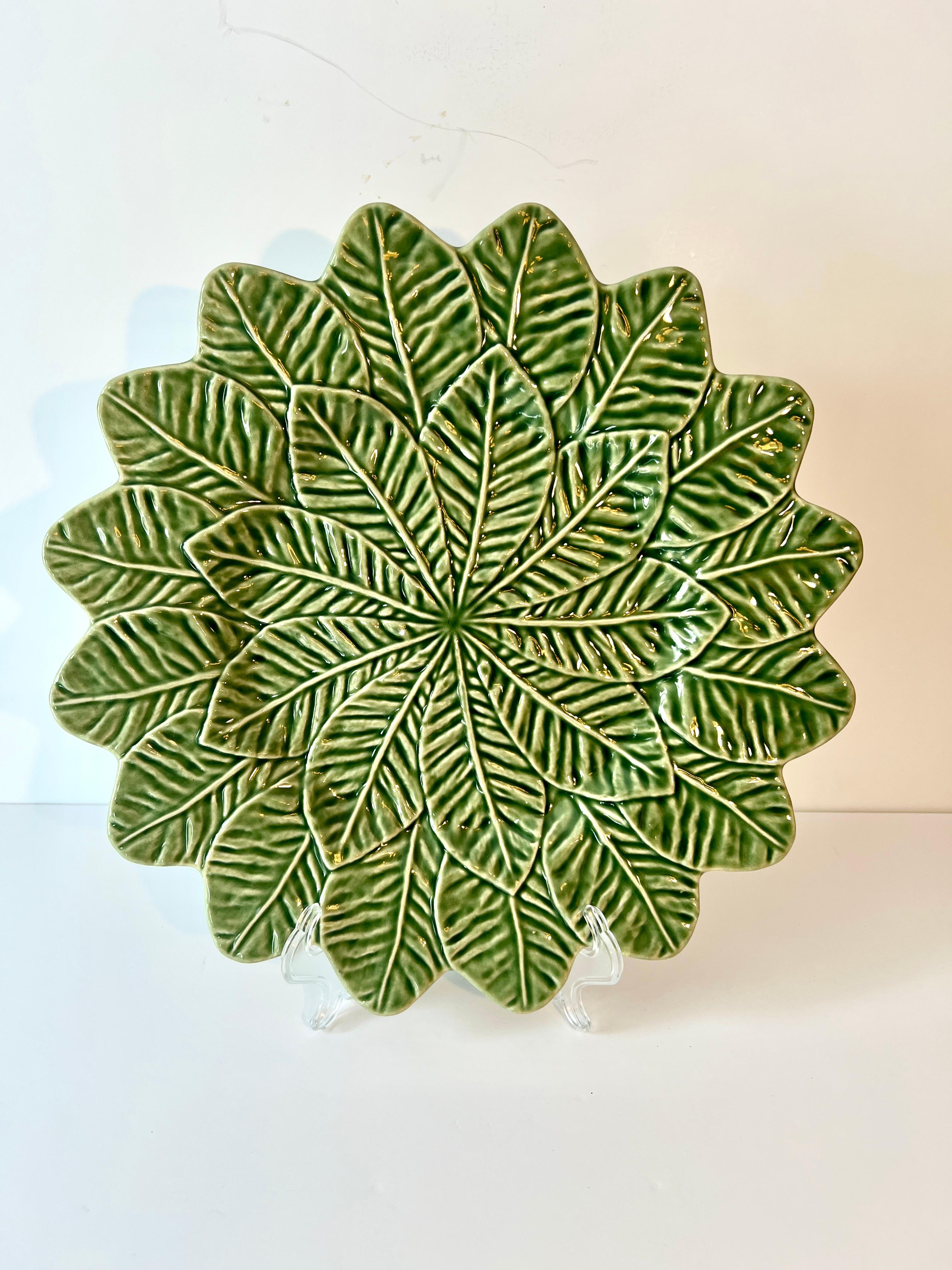 A set of 12 Majolica Bordallo Portugal Terra Cotta Cabbage Charger Plates.  At 13