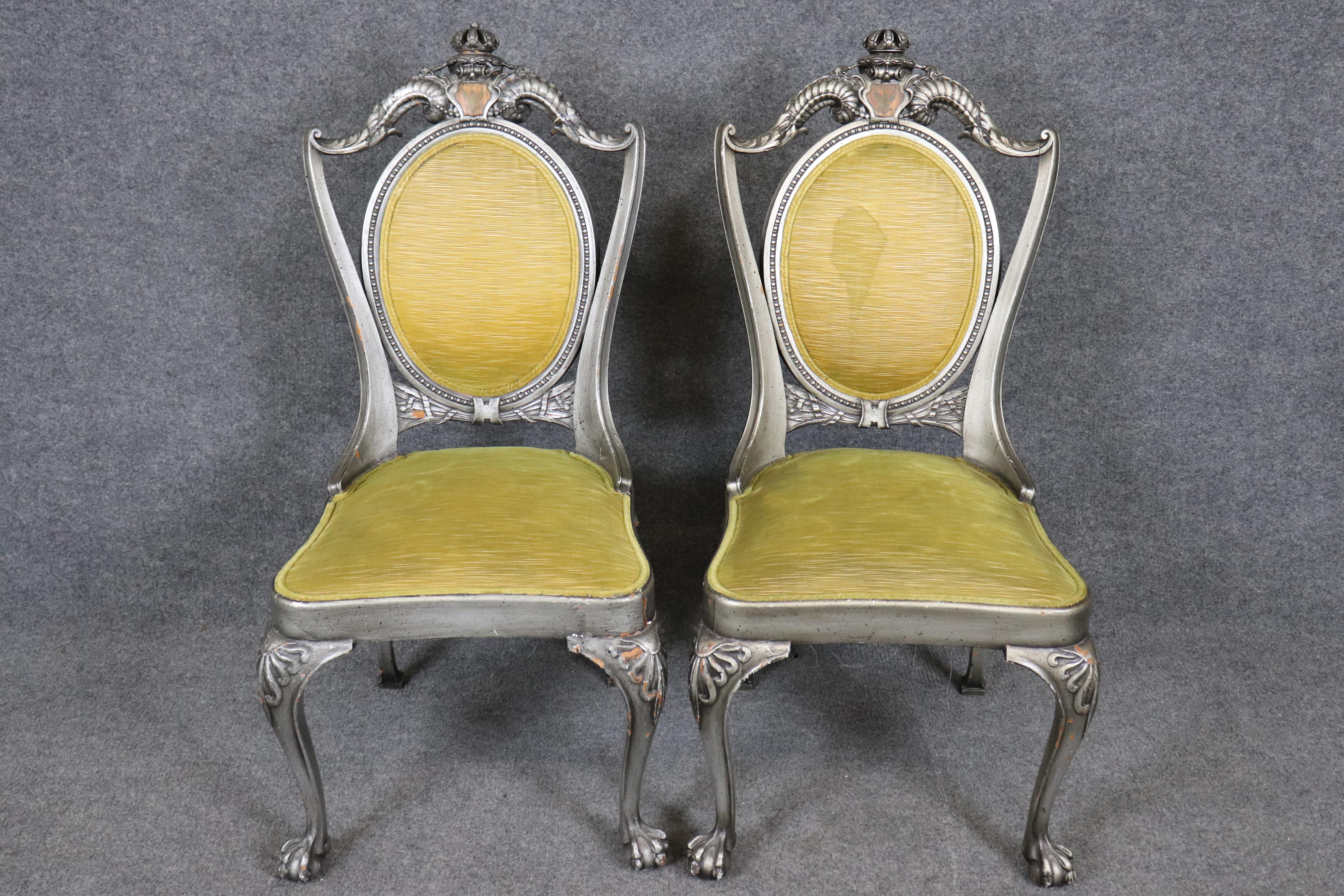 Early 20th Century Set of 12 Caned Ball and Claw English Armoreal Dining Chairs For Sale