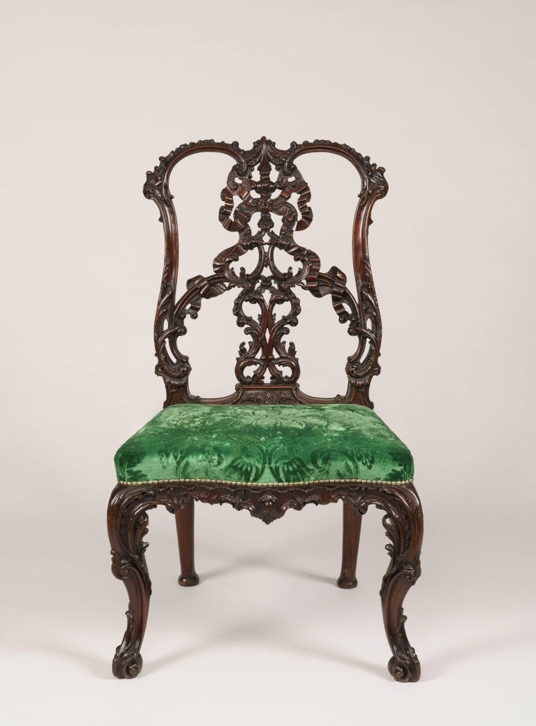 Set of 12 Carved Mahogany Dining Chairs in the Manner of Thomas