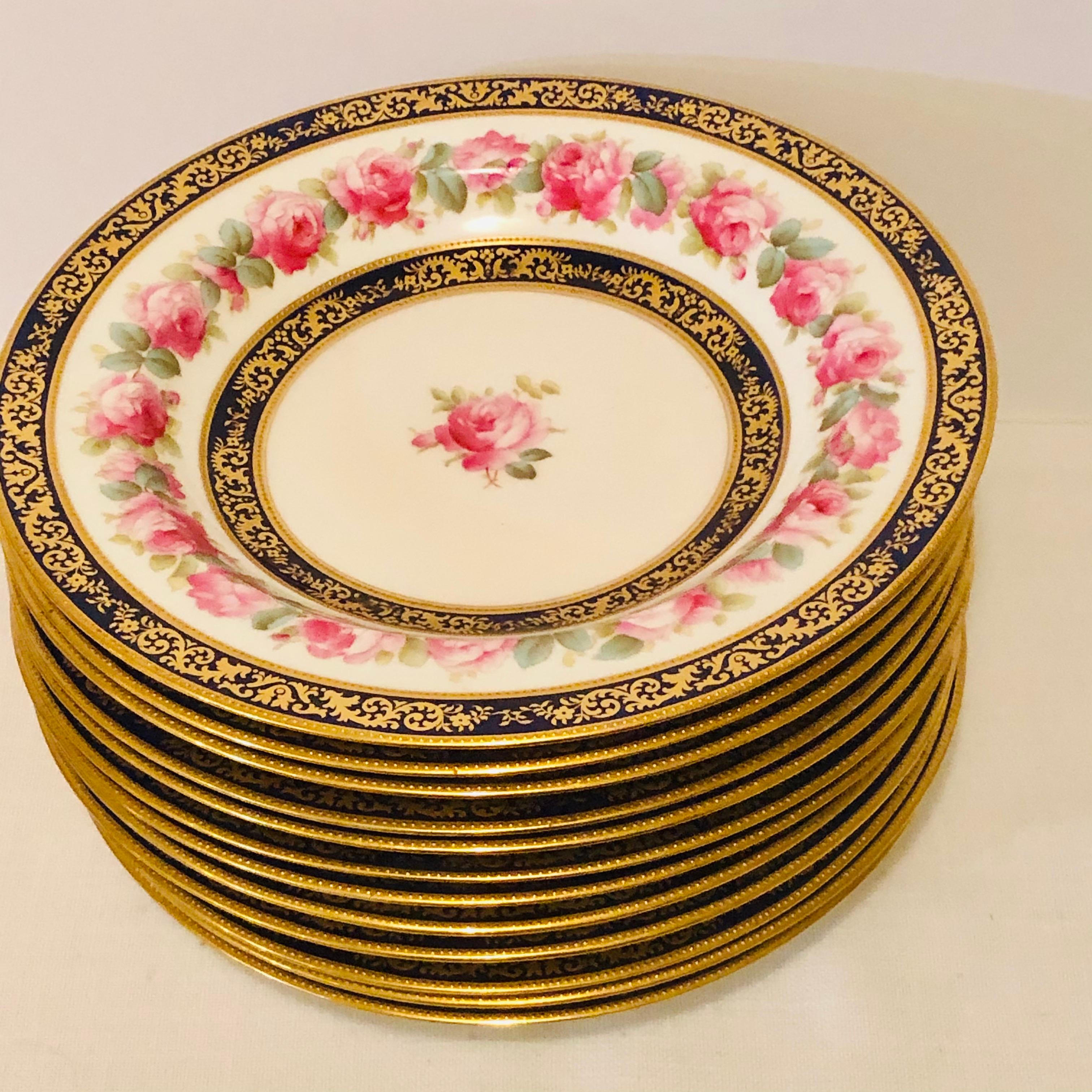 English Set of 12 Cauldon Wide Rim Soups with Pink Rose Paintings and Two Cobalt Borders For Sale