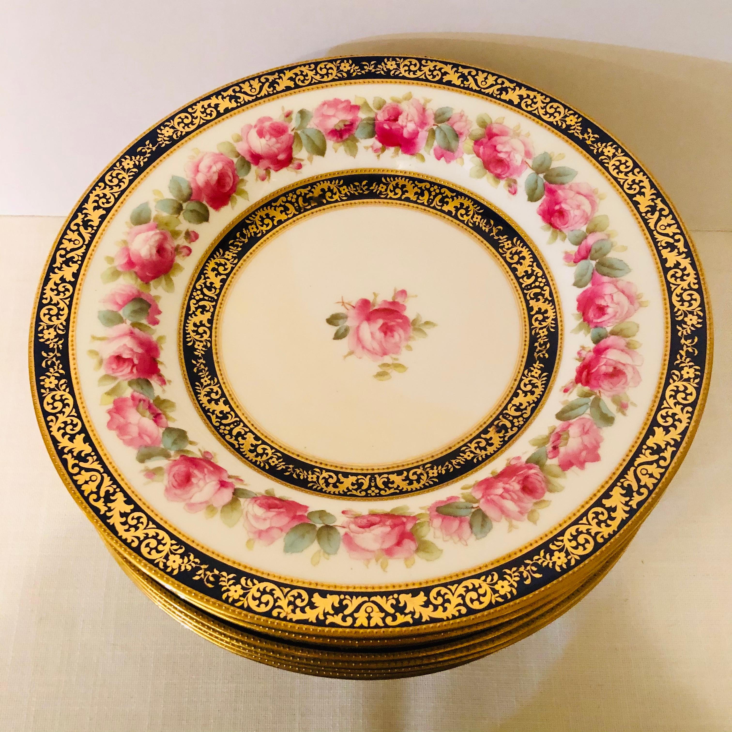 Porcelain Set of 12 Cauldon Wide Rim Soups with Pink Rose Paintings and Two Cobalt Borders For Sale
