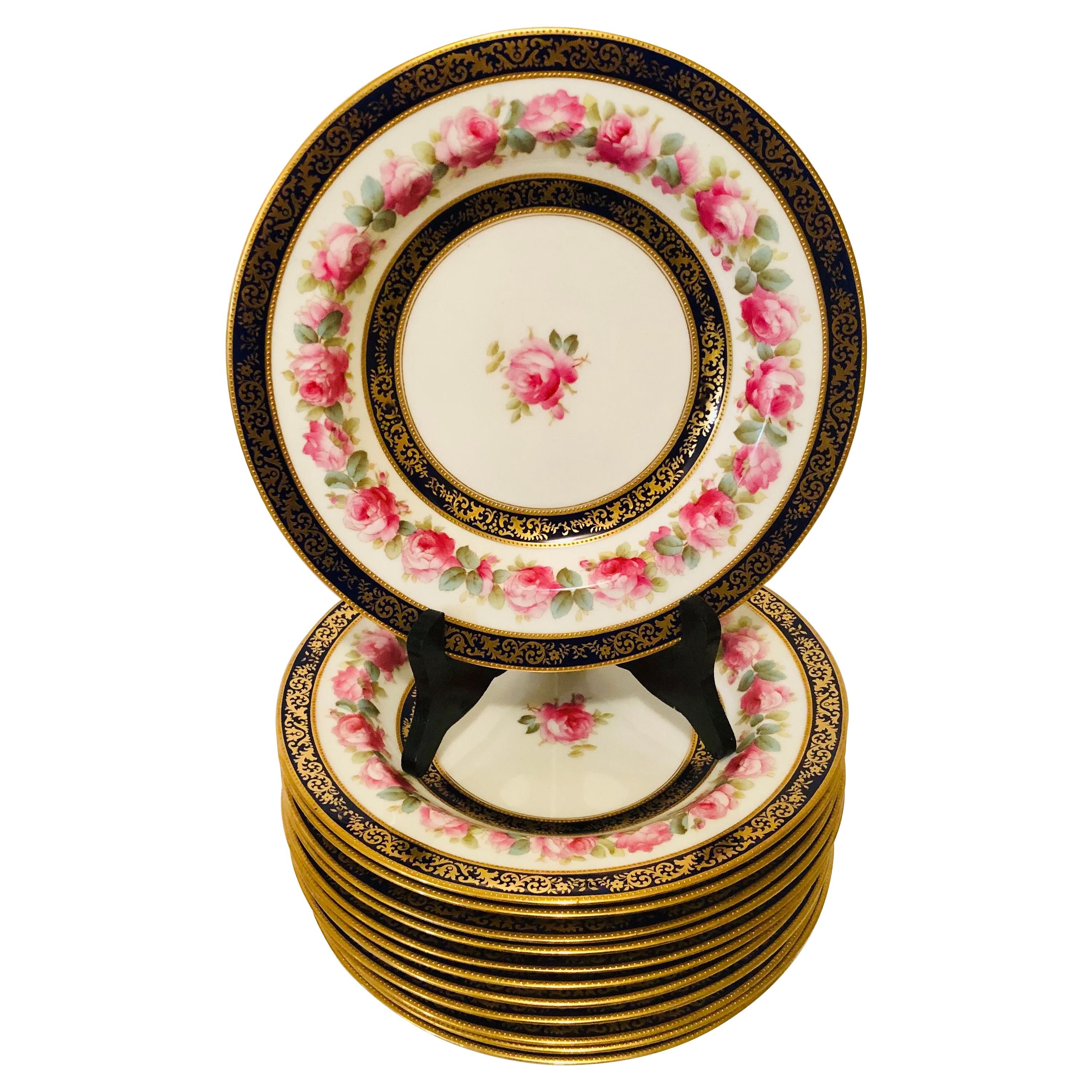 Set of 12 Cauldon Wide Rim Soups with Pink Rose Paintings and Two Cobalt Borders For Sale