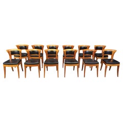 Juego de 12 sillas de comedor de madera de cerezo de Leon Krier Modelo Sella Media de Giorgetti