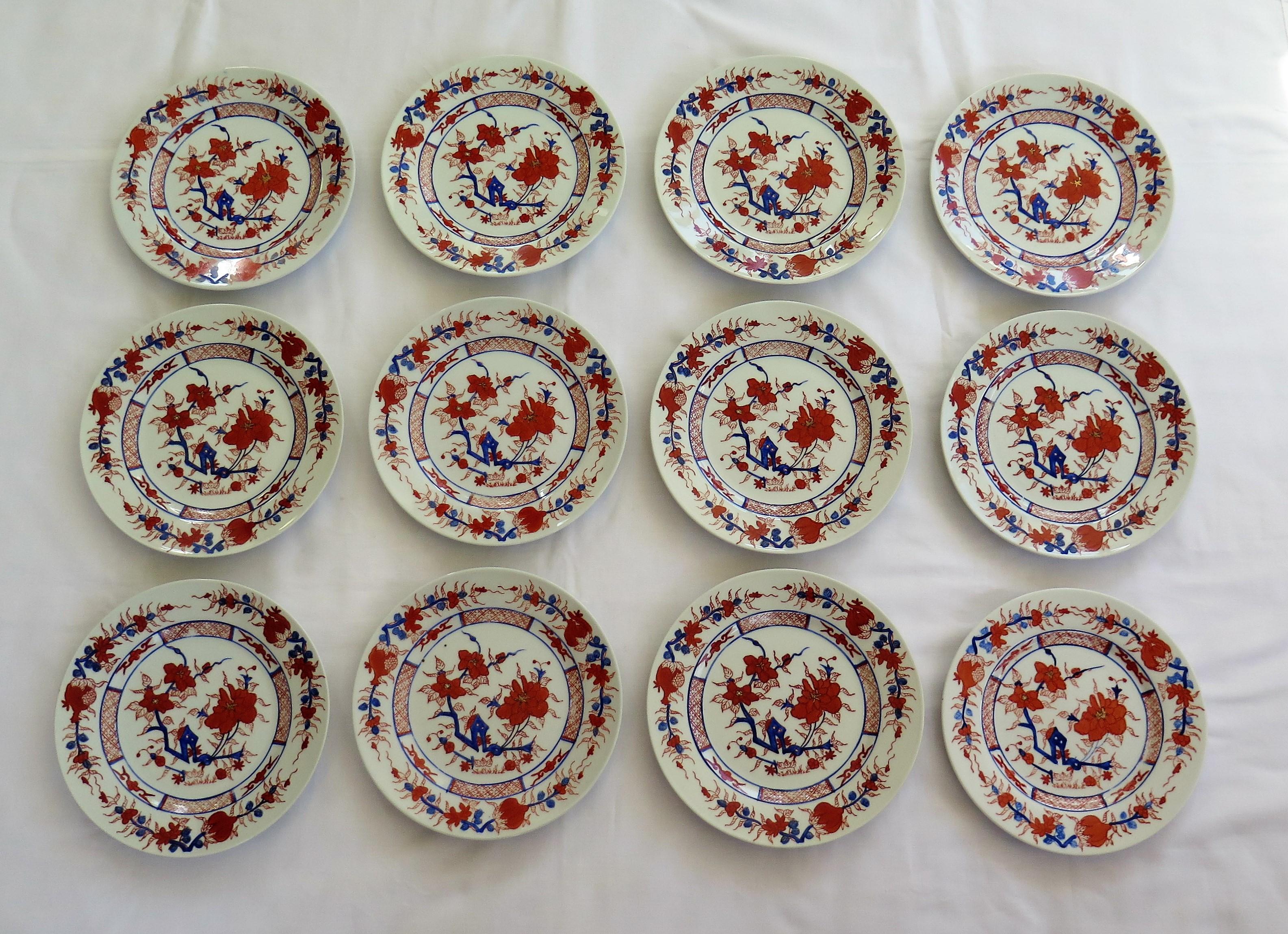 These are a very good set of 12 Chinese Export porcelain side plates.

Each plate is hand decorated in a bold floral imari pattern using brick red and cobalt blue enamels in various shades. The plates have various borders including an alternating