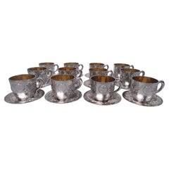 Set of 12 Chinese Export Silver Dragon Teacups and Saucers