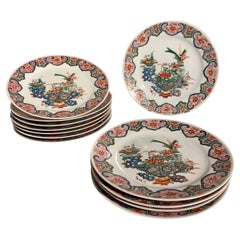 Set di 12 piatti da portata in porcellana cinese Famille Rose, fine XX secolo, Cina