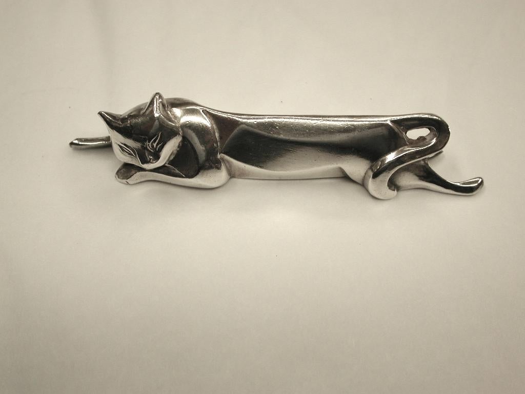 A set of 12 Christofle 'Gallia' Metal Knife Rests; The Design Attributed to Eduard Marcel Sandoz
circa 1920.
Each modelled and cast as a stylised animal or bird, comprising: a peacock, a swan, a dove, a bear, a lion, a pelican, a hare, a
