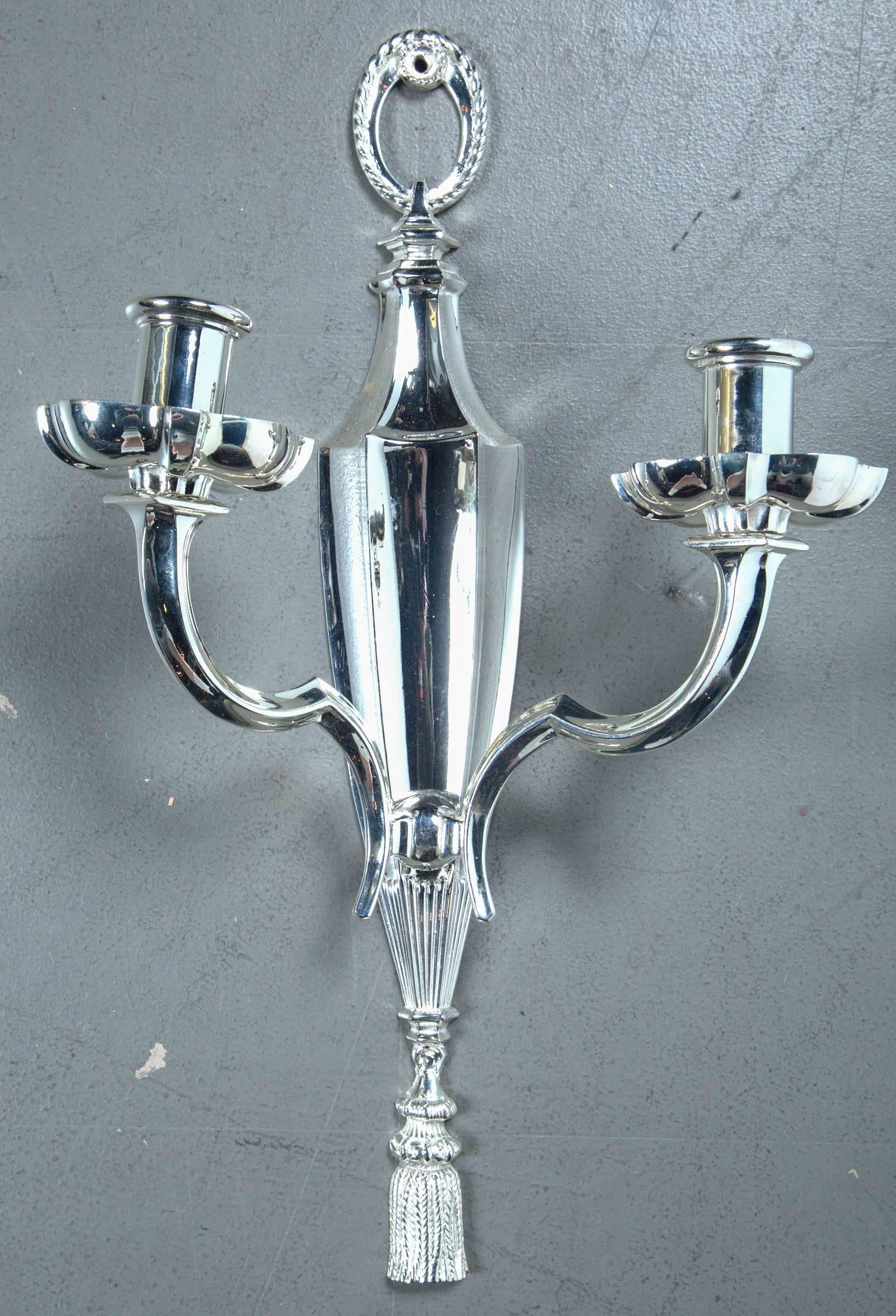 A set of 12, circa 1920s Caldwell sconces; $6,800 list pair, six pairs available.