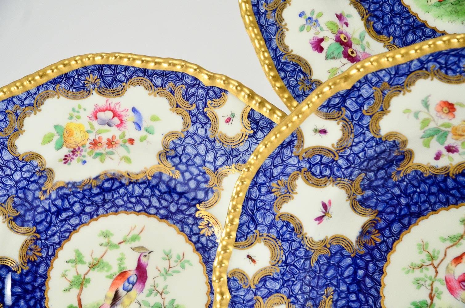 Early 20th Century Set of 12 Coalport Hand Painted Exotic Bird Lapis Blue & Gilt Soup Bowls Plates For Sale