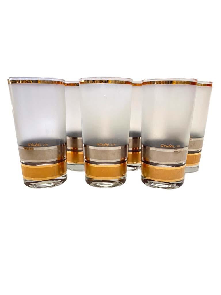 Vintage Mid-Century Modern set of 6 Collins and 6 Highball glasses by Culver. The style is called Regency and the glasses are frosted. The top stripe is silver and the bottom is 22k gold. Glasses have the Culver Ltd. makers mark on them and are in