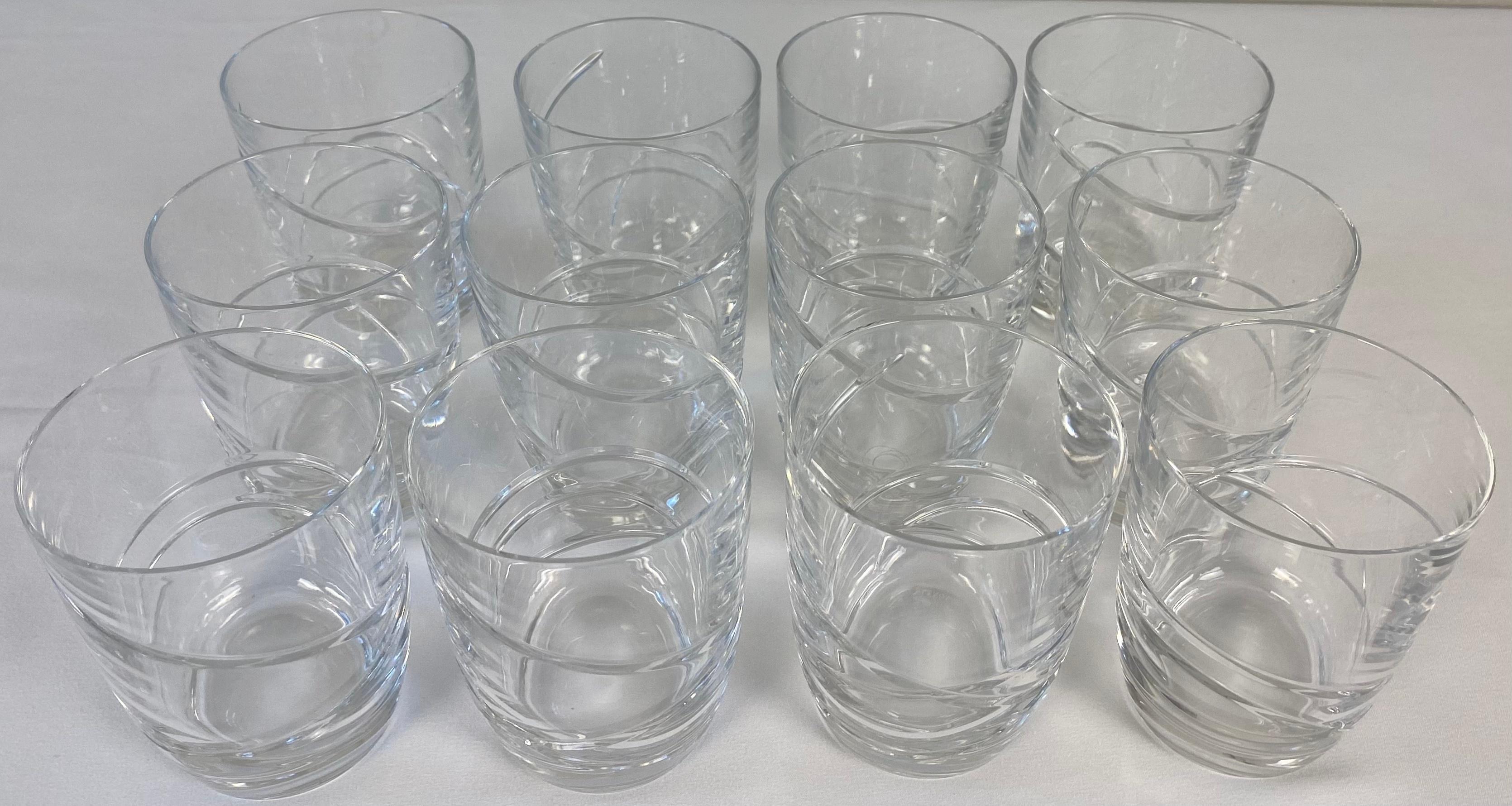 A fine high quality vintage set of 12 crystal whiskey or liquor glasses by Lenox. 
American design made in the Czech Republic.

Bears the Lenox mark on the bottom. 

Measures: 3 1/8