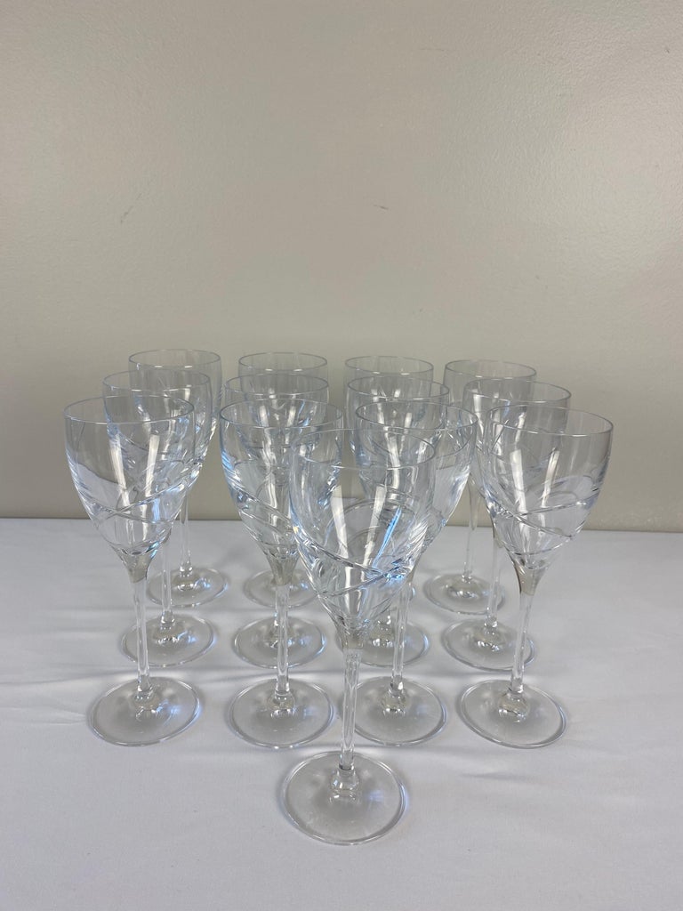 A fine high quality vintage set of 12 crystal wine glasses by Lenox. 
American design made in the Czech Republic.

Bears the Lenox mark on the bottom. 

Measures: 2 7/8