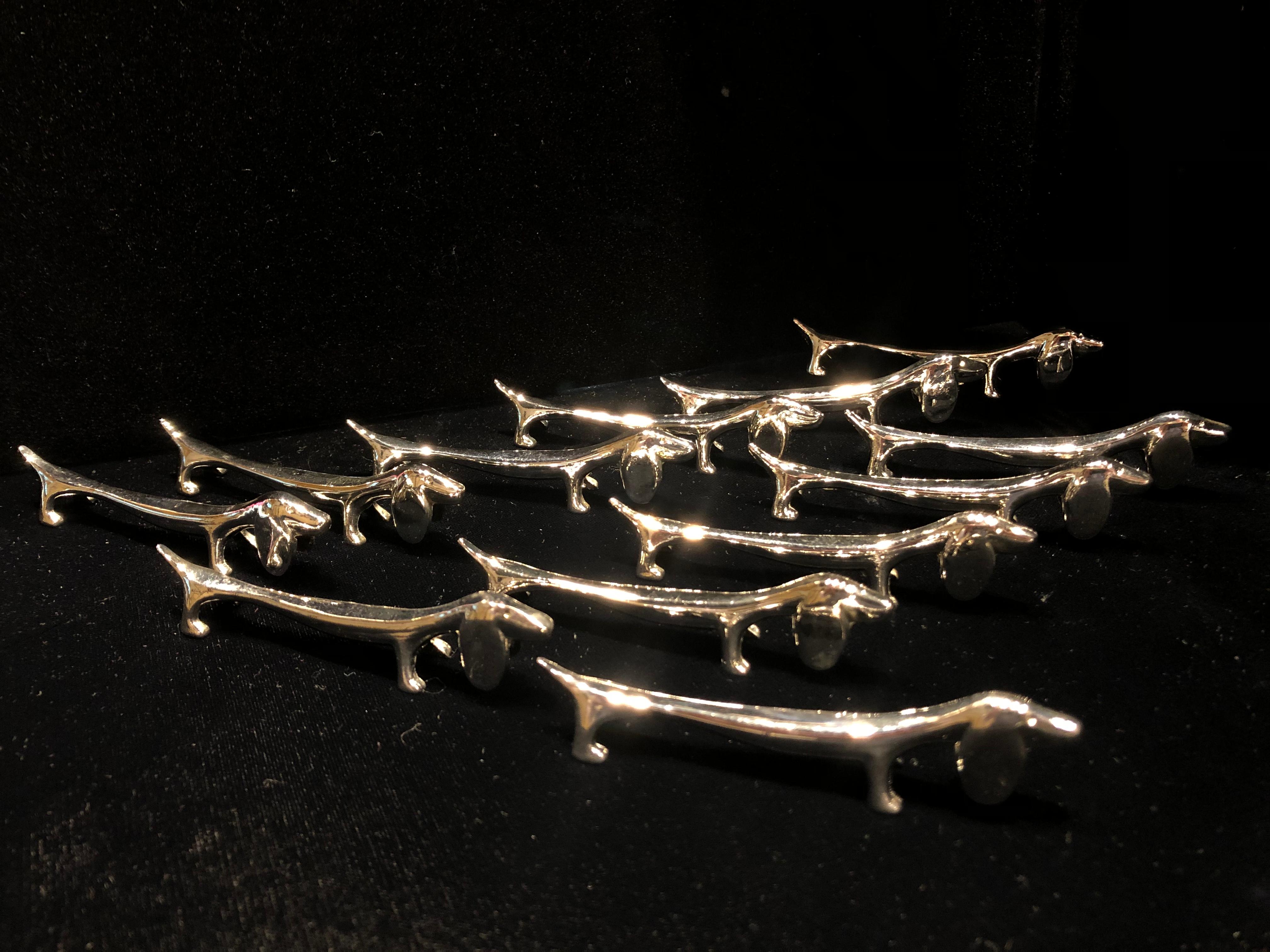 Set of twelve Dachshund dog silver plated knife rests, vintage in very good look to be unused from the 1950s.