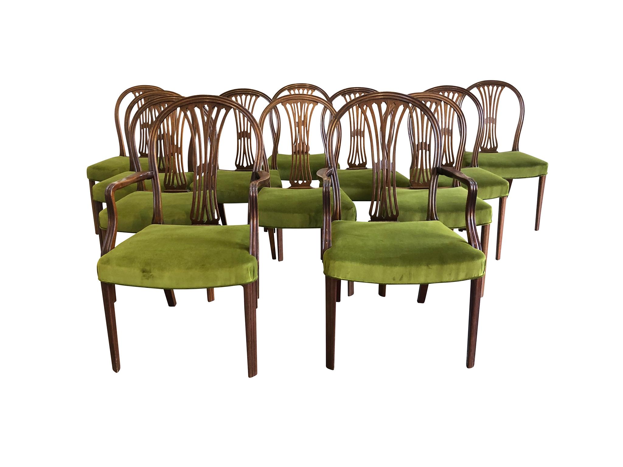 Frits Henningsen's designs are renowned for their excellent craftsmanship. This set of 1930s dining chairs are among his best works. They are mahogany and newly reupholstered in fern-green Gainsborough velvet from Schumacher. The set is comprised of