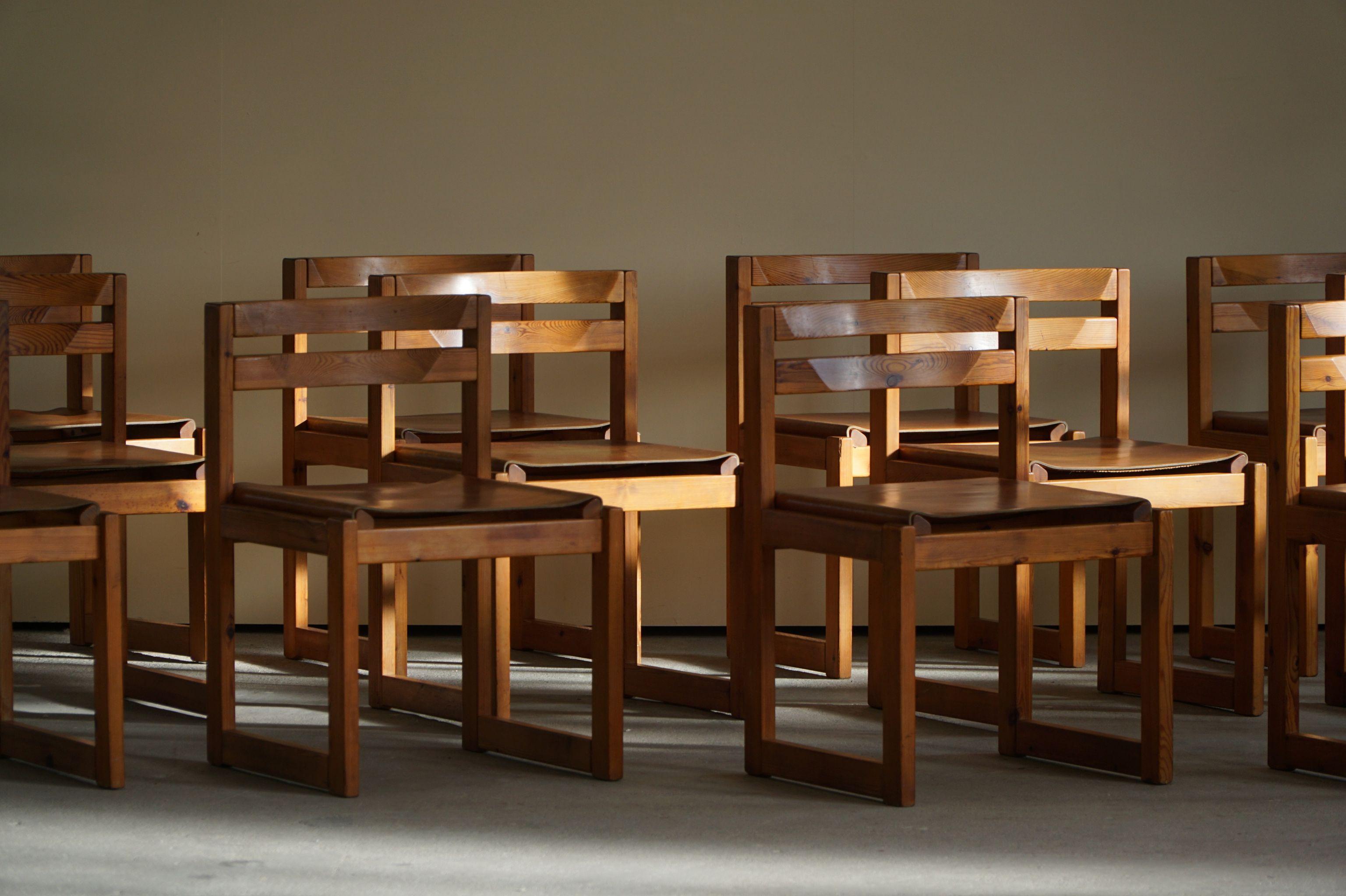 Danish mid-century dining chairs in pine and leather, made by Knud Færch for Sorø Møbelfabrik in 1970s, set of 12. 

The set is in a overall great vintage condition. The wooden frame has a warm patina and the leather is without any visible