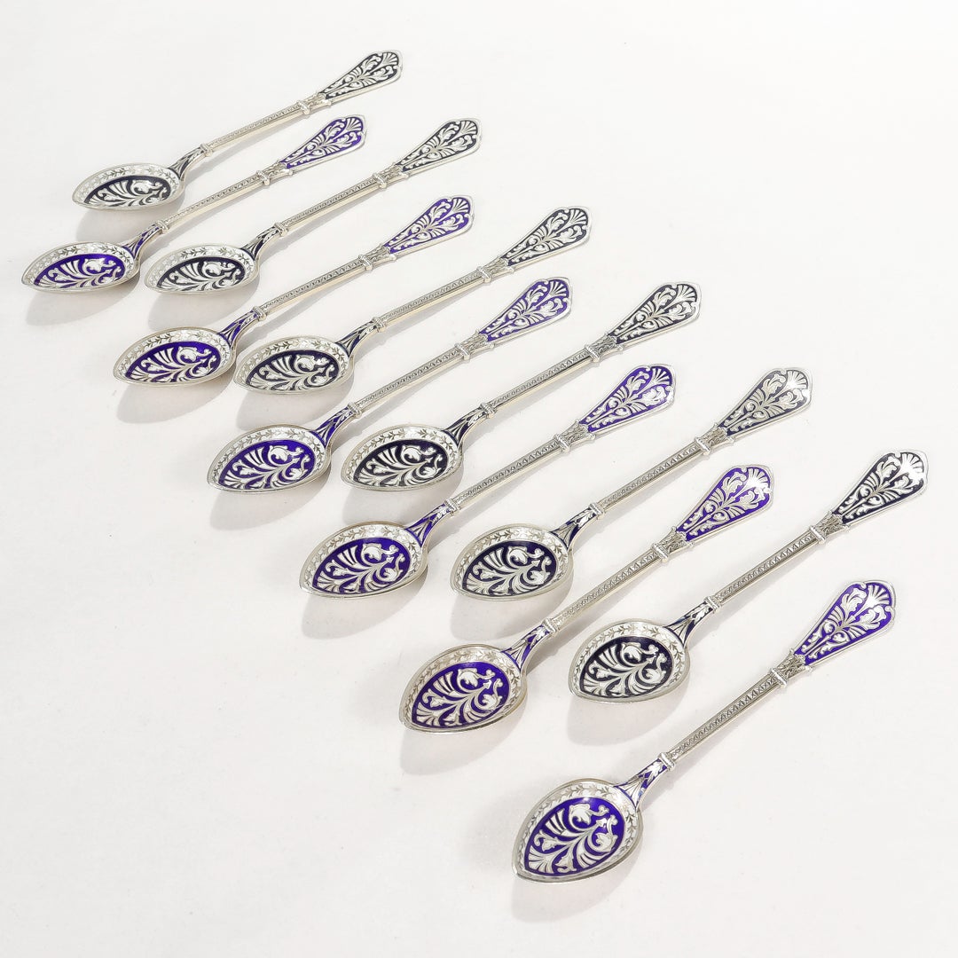 A fine set of 12 demitasse and coffee spoons.

By the David Andersen silver company of Oslo, Norway.

In gilt sterling silver with ornate cobalt blue and white enamel decoration. 

Decorated in the Imperial Russian taste.

Simply a wonderful and