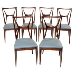 Set of 12 dining chairs attributed to Atelier Apelli and Varesio