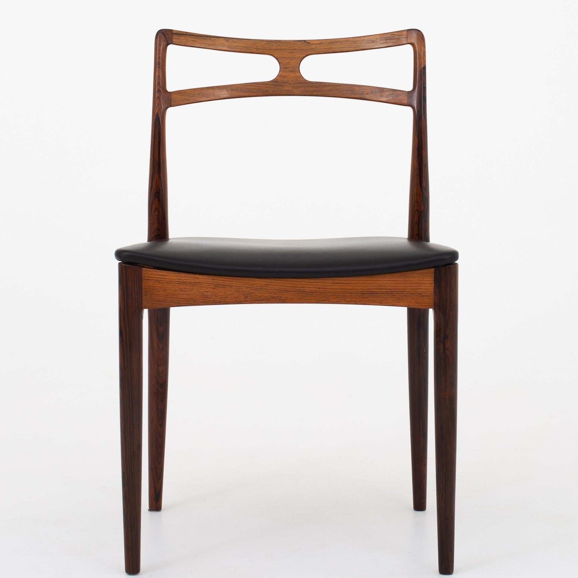 Large set with 12 dining chair in rosewood with black leather. Maker Christian Linneberg.