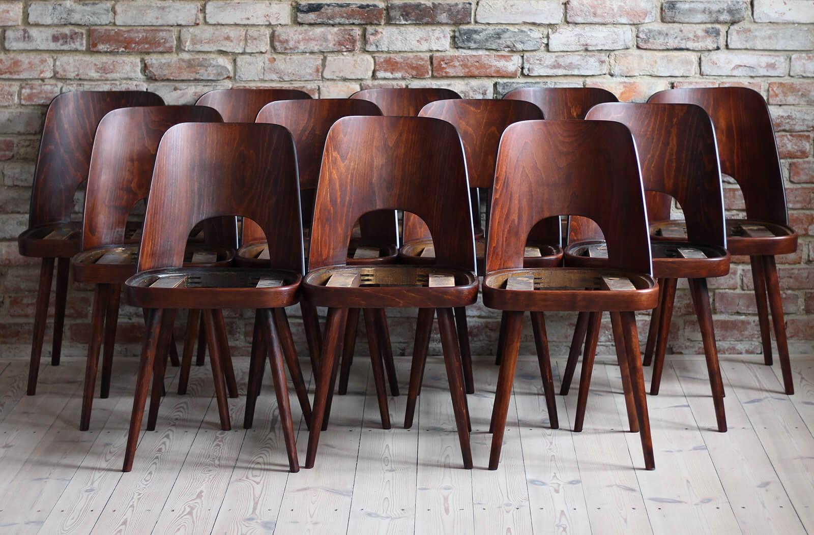 This set of 12 vintage dining chairs was designed by Oswald Haerdtl in the 1950s, famous Austrian designer - together with Mr. Josef Hoffmann he designed the cafe terrace at the Vienna Werkbund Exhibition of 1930, where they designed every little