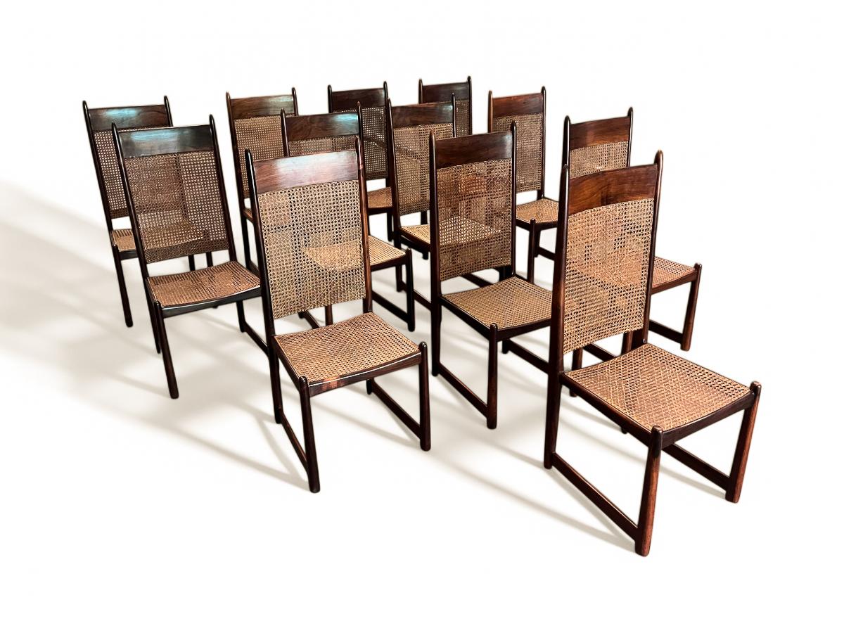 Travail du bois Ensemble de 12 chaises de salle à manger en bois dur et cannage par Fatima, c. 1960s en vente