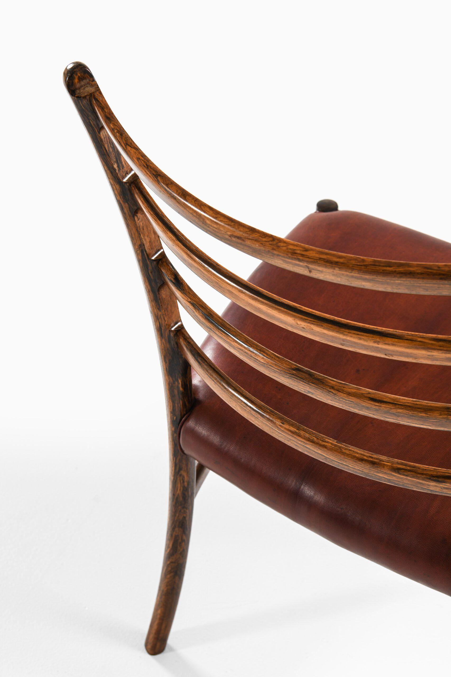 Mid-20th Century Set of 12 Dining Chairs in Rosewood and Leather, 1960s For Sale