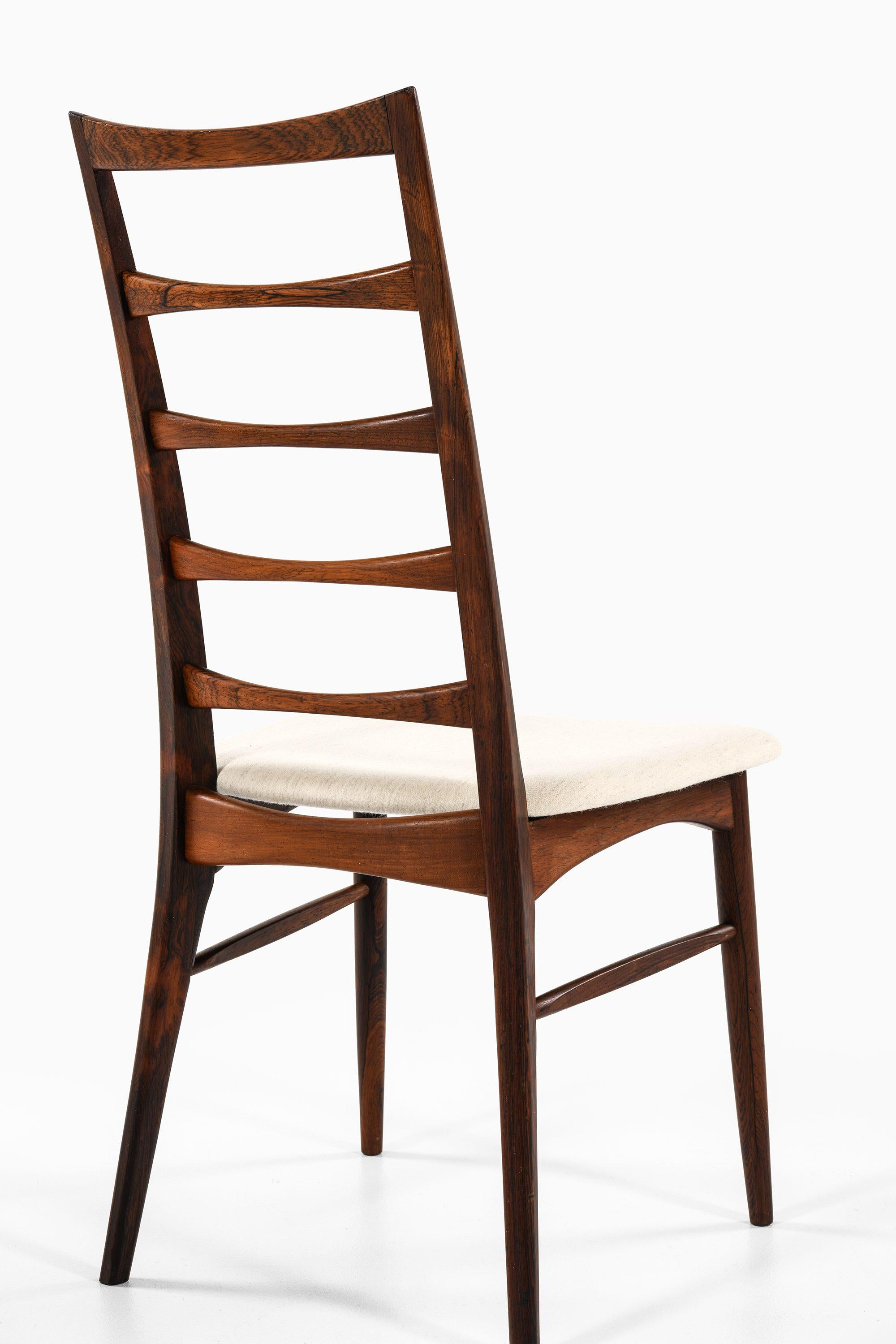 Scandinavian Modern Set of 12 Dining Chairs in Rosewood by Niels Kofoed, 1961 For Sale
