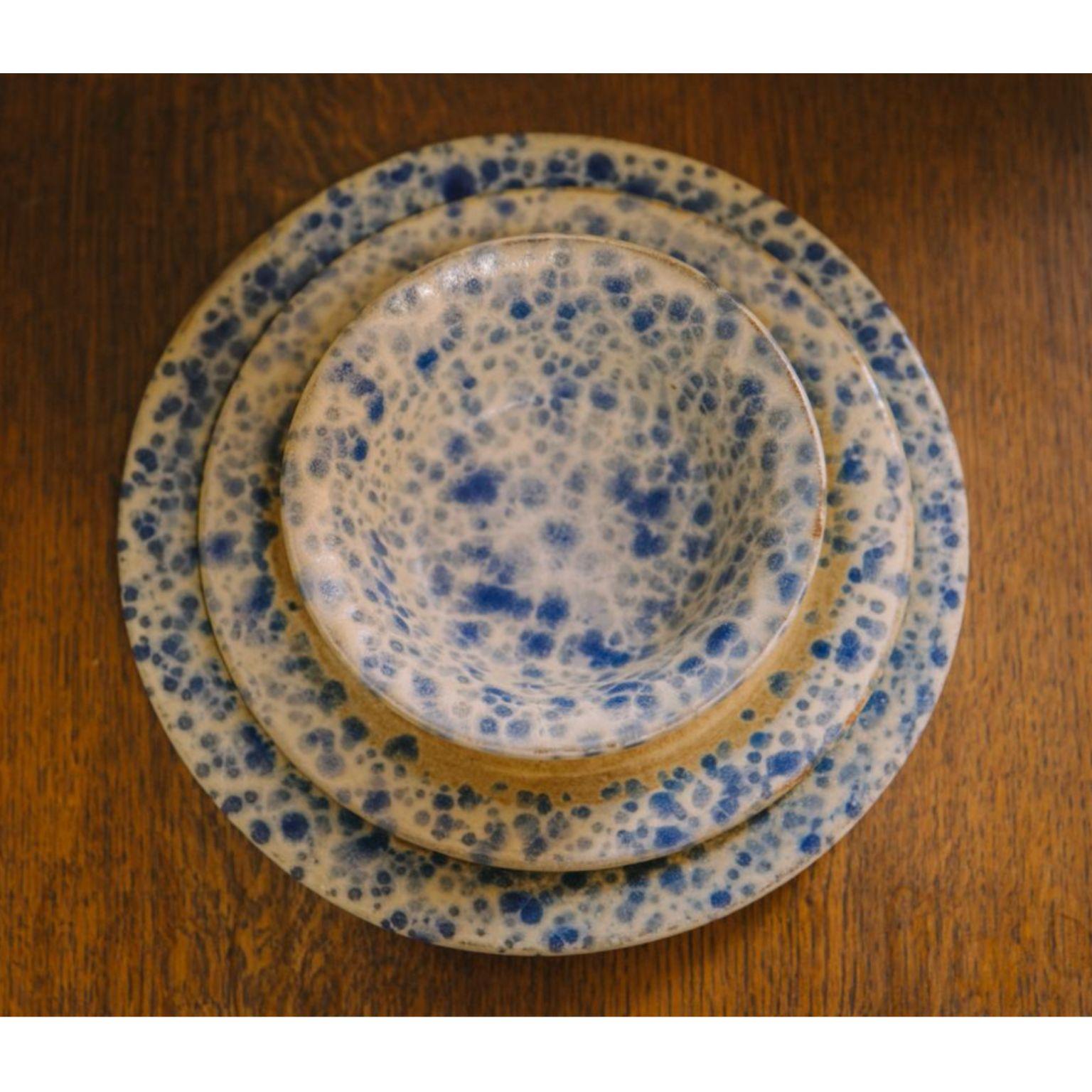 Set of 12 Plates by Casa Alfarera
Dimensions:
Dinner plates 25 cm in diameter
Salad/dessert plates 20 cm in diameter
Bowls 15 in diameter
Materials: stoneware

Hand-thrown Dominican stoneware body fired to 1250 degrees celsius over an oxidation