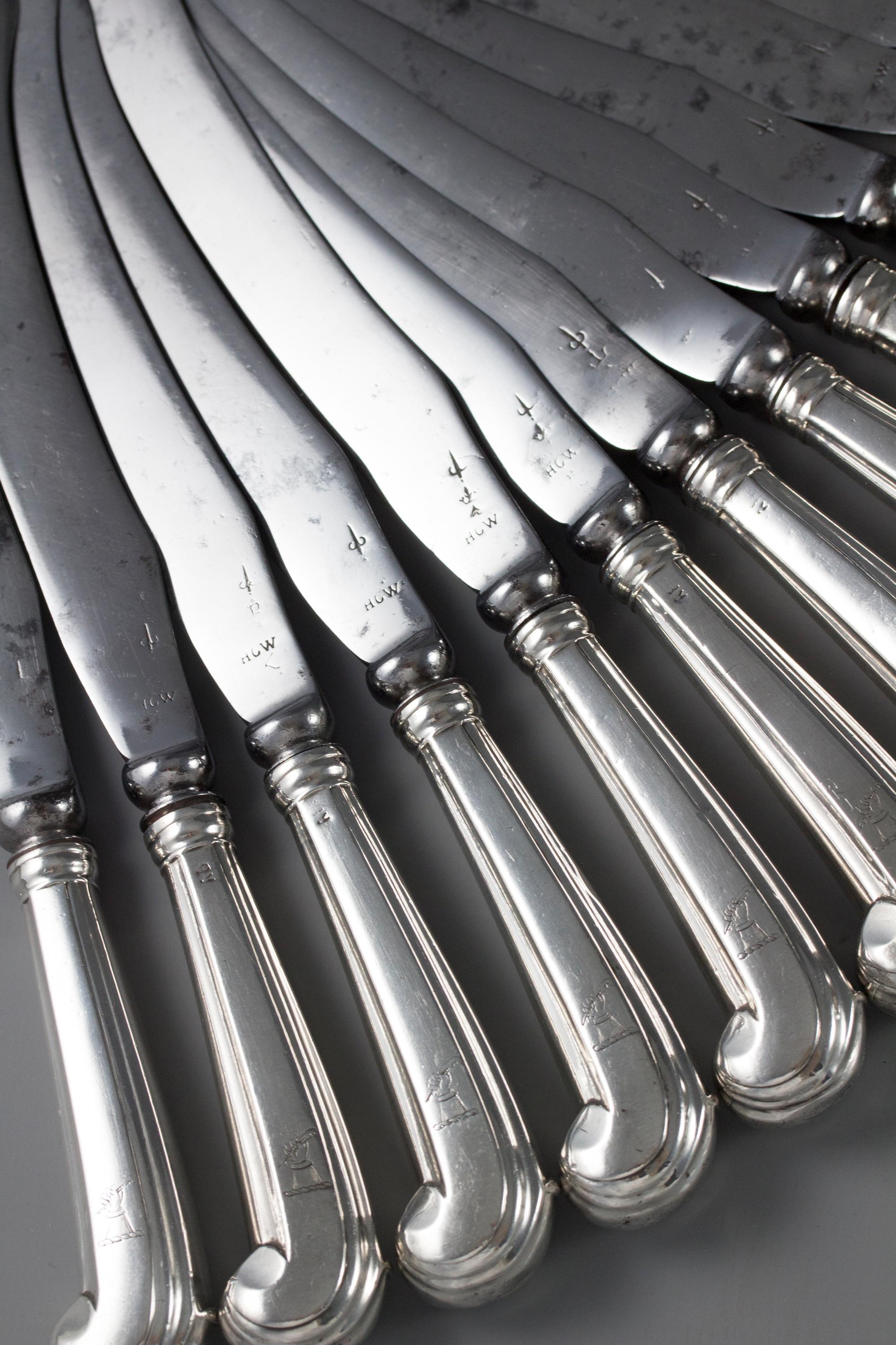 Set of 12 Early 18th Century Pistol Grip Table Knives 1