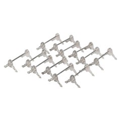 Juego de 12 apoyacuchillos plateados de principios del siglo XX
