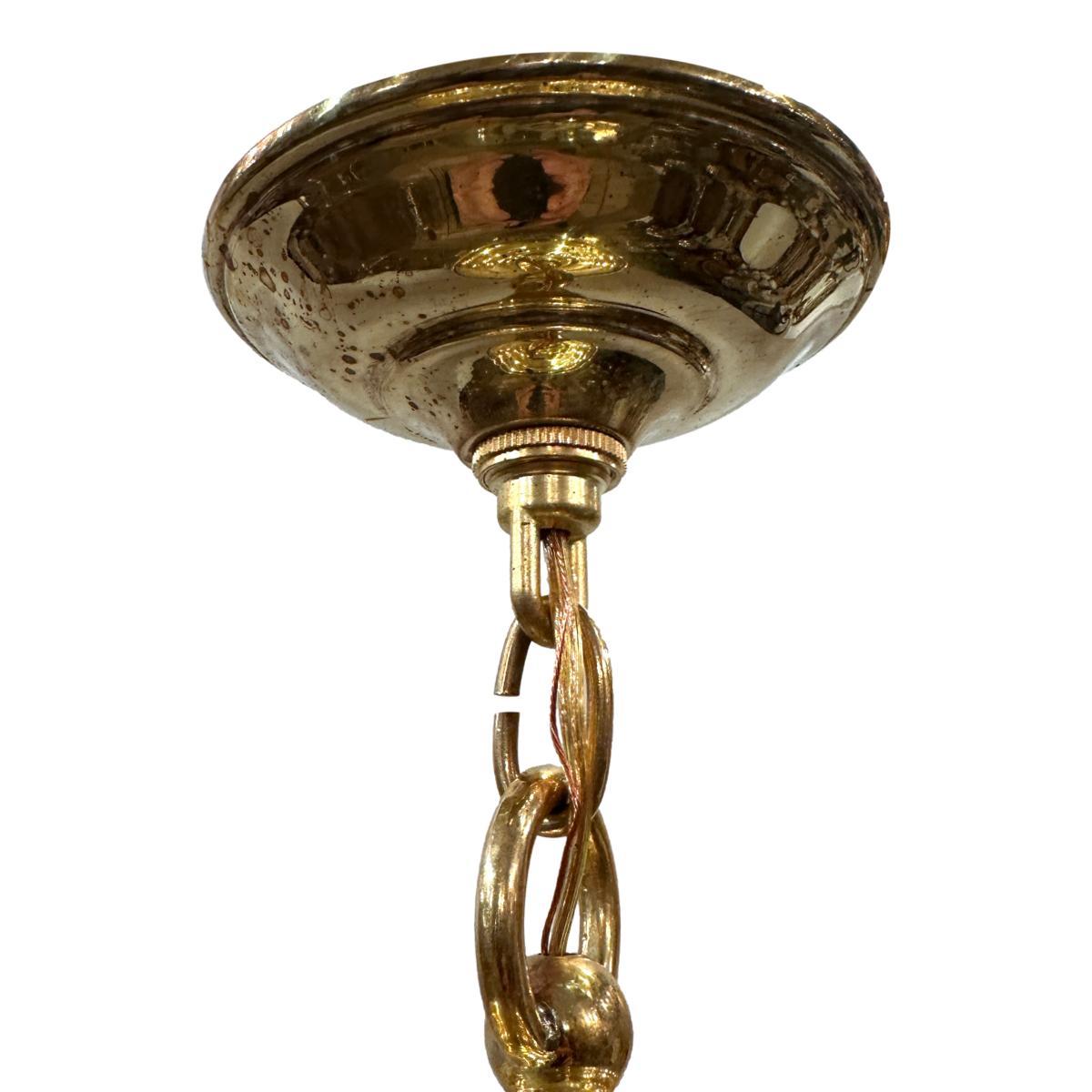 Set of circa 1960's brass and glass lanterns with four interior lights. Sold individually.

Measurements:
Height of body: 20