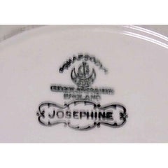 Set of 12 English Victorian cream-colored porcelain plates