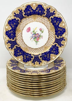 Set of 12 English Wedgwood Cobalt Blue with Gold Detail Porcelain Dinner Plates.