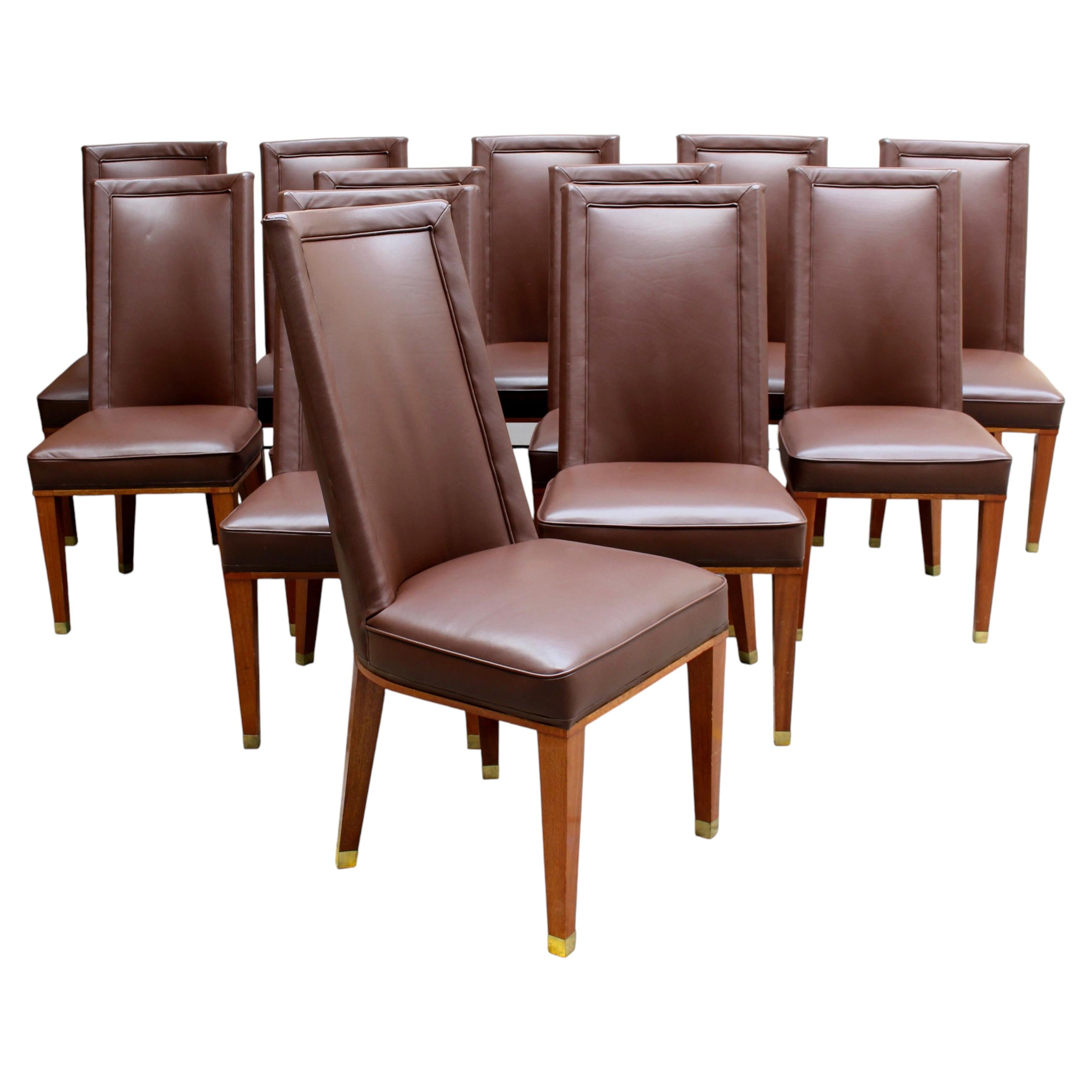 Set of 12 Fine French 1950s Mahogany and Leather Dining Chairs by Jacques Adnet For Sale