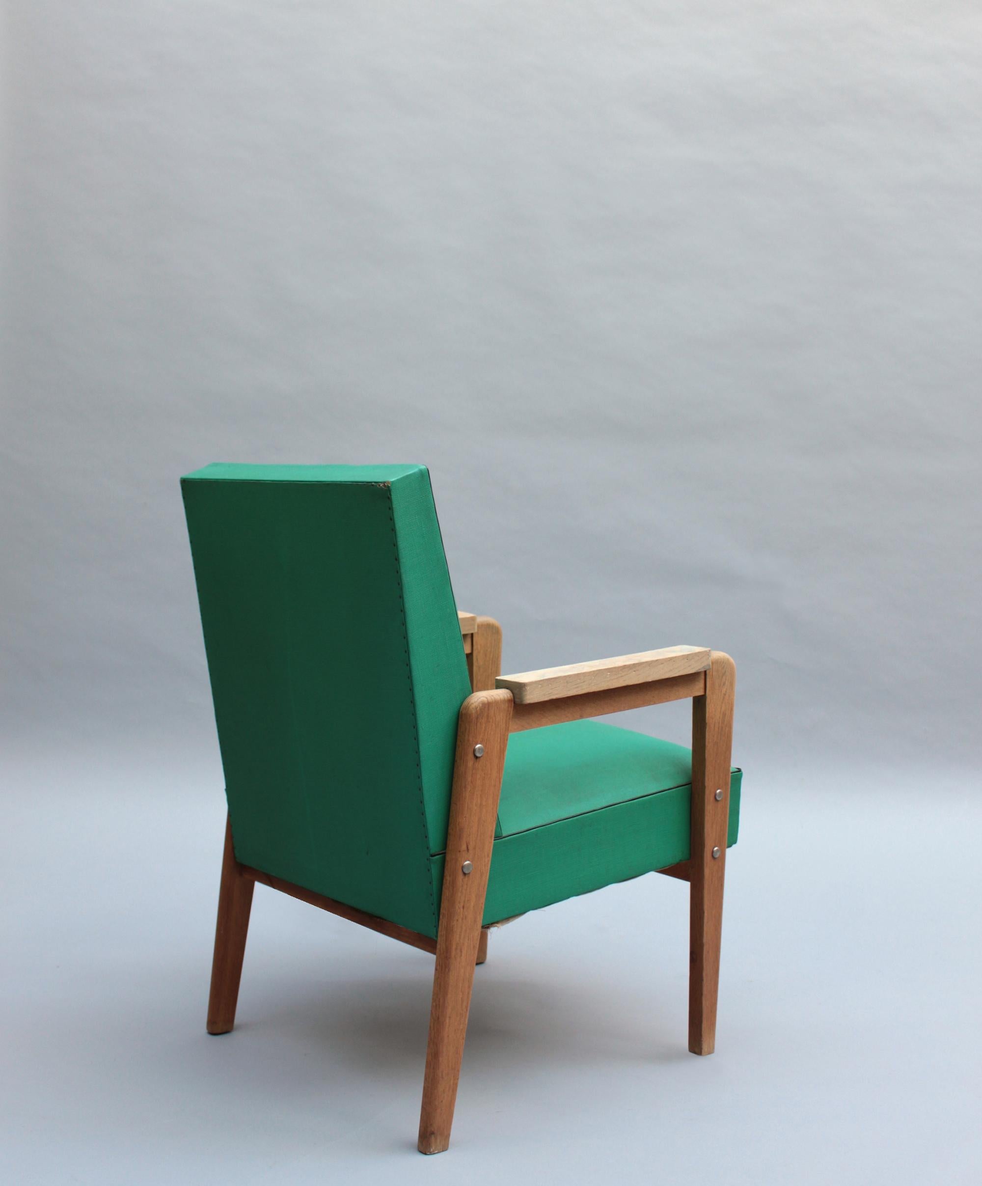 Milieu du XXe siècle Ensemble de 12 fauteuils en chêne des années 1950 de Marcel Gascoin en vente