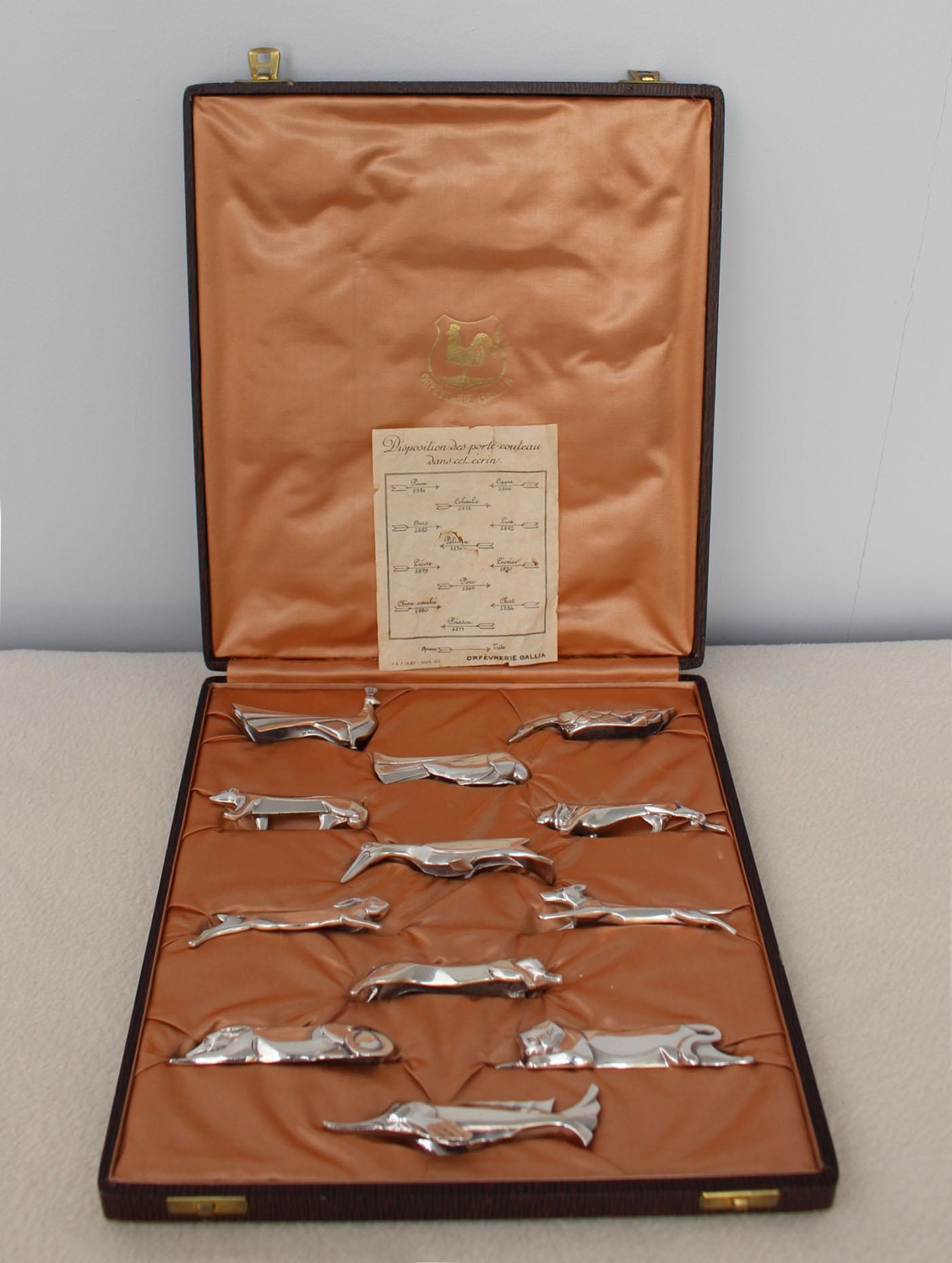 Set of 12 fine French Art Deco silver plated knife rests designed by Marcel Sandoz for the Gallia collection of Christofle. All 12 animals are different.
Original case.

Two sets are available (price is for one set of twelve)

Average size of knife