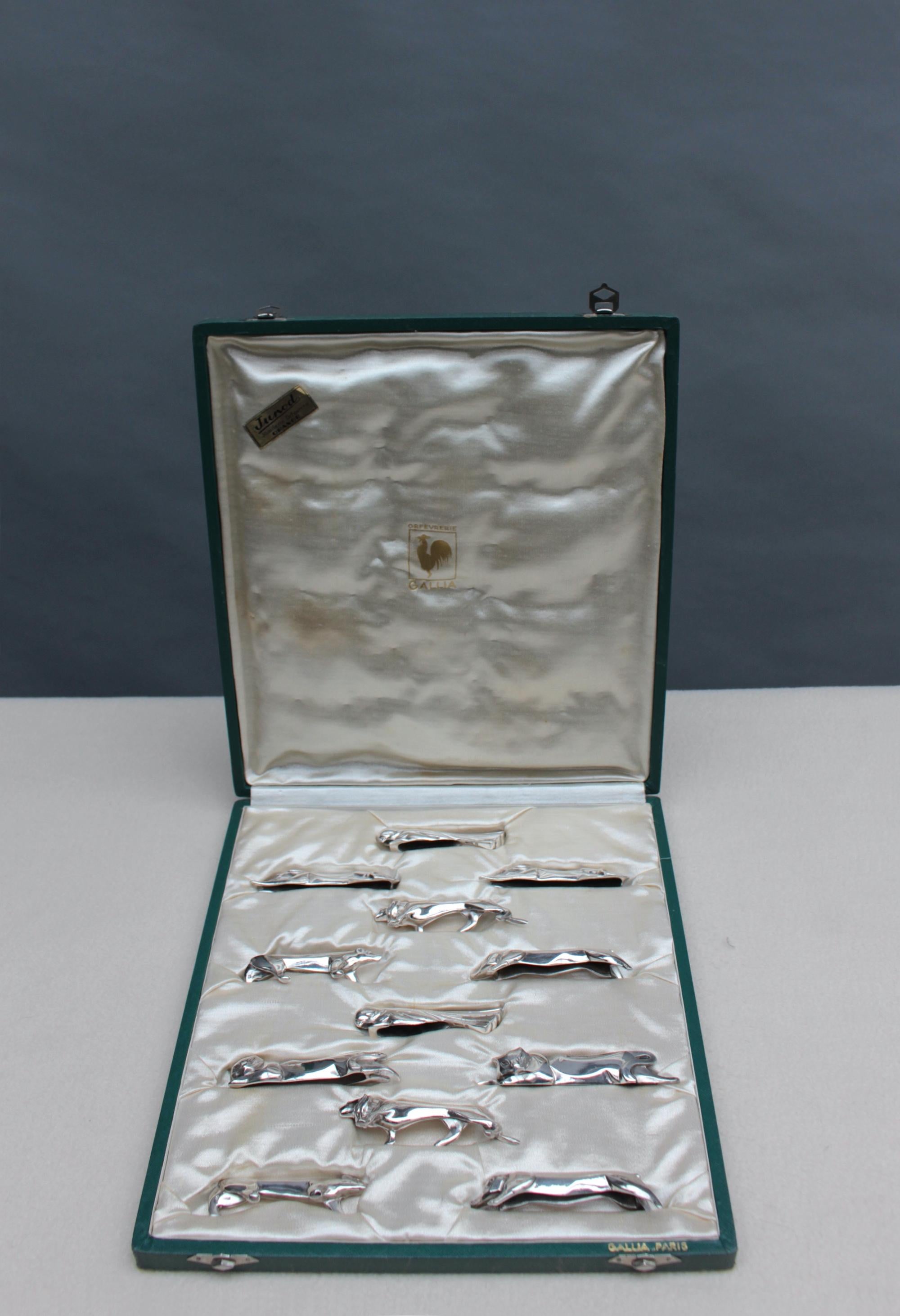 Set of 12 fine French Art Deco silver plated knife rests designed by Marcel Sandoz for the Gallia collection of Christofle. Six different animals are reproduced twice. 
Original case.

Average size of knife rests:
H 0.8 inch x L 4.3 inch x W 0.8