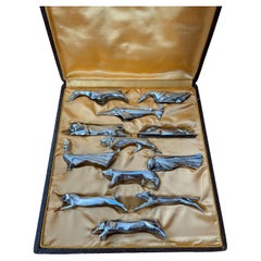 Ensemble de 12 porte-couteaux "Gallia" en métal argenté de style Art Déco français par Christofle