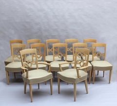 Set of 12 Fine French Art Deco Walnut Chairs by Jules Leleu (10 Side and 2 Arm)
