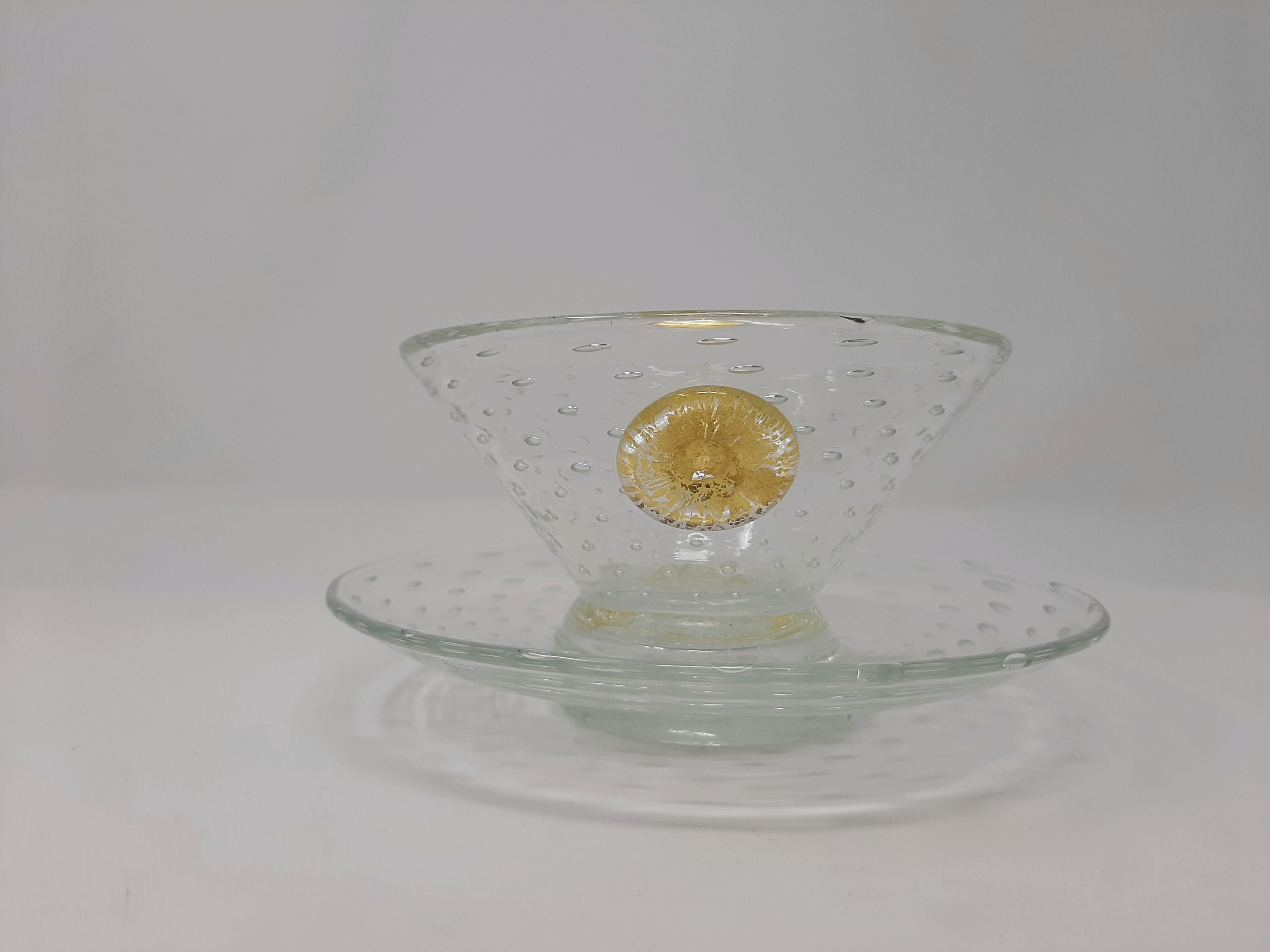 Set of 12 finger bowls and saucer by Barovier & Toso, circa 1940s.
Measures: Cup height 6.5 cm
Cup diameter 13 cm
Saucer diameter 16.5 cm.
 