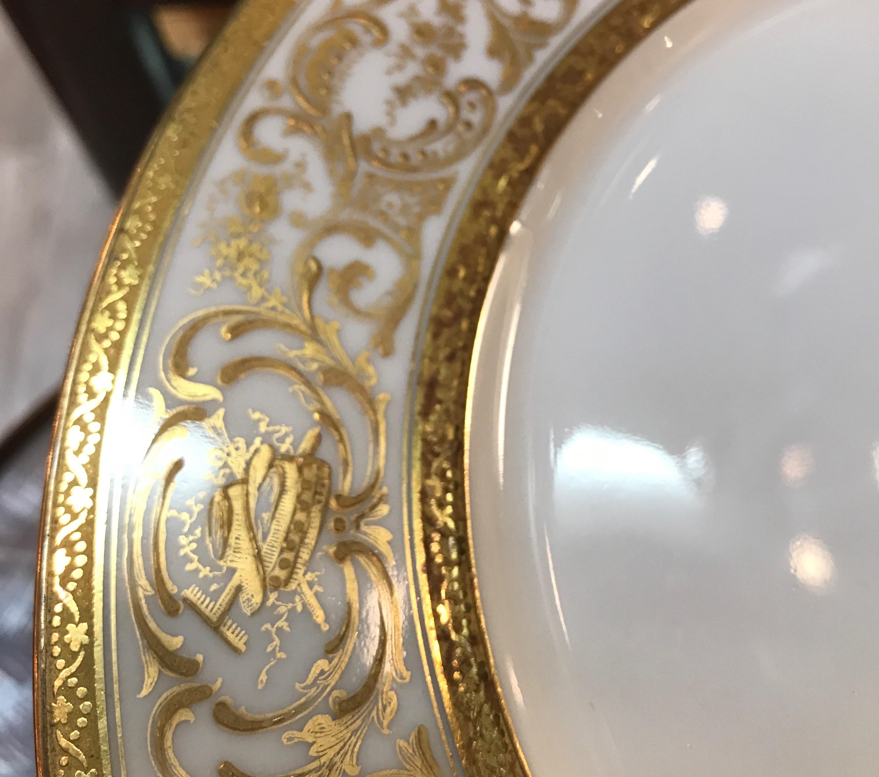 Early 20th Century Set of 12 French Antique Raised Gilt Plates, circa 1900