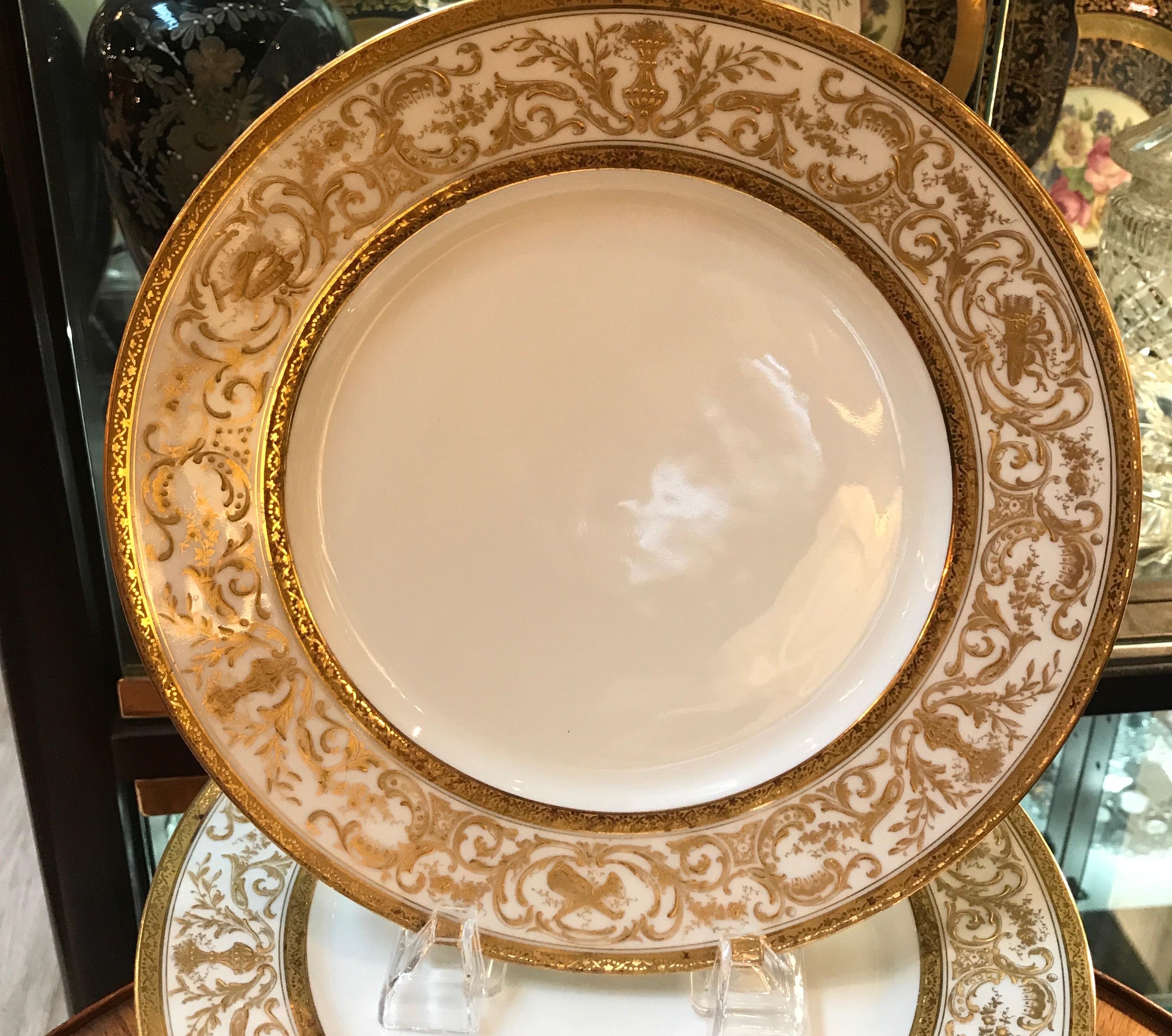 Porcelain Set of 12 French Antique Raised Gilt Plates, circa 1900