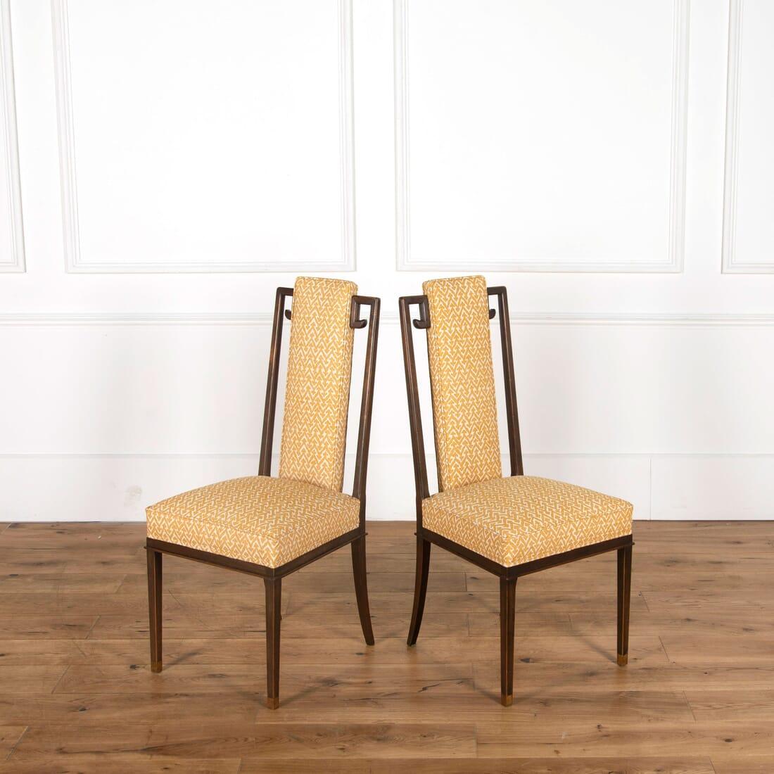 A stylish set of 12 French midcentury dining chairs in Chinese style with sabot feet – recovered in Fermoie linen.