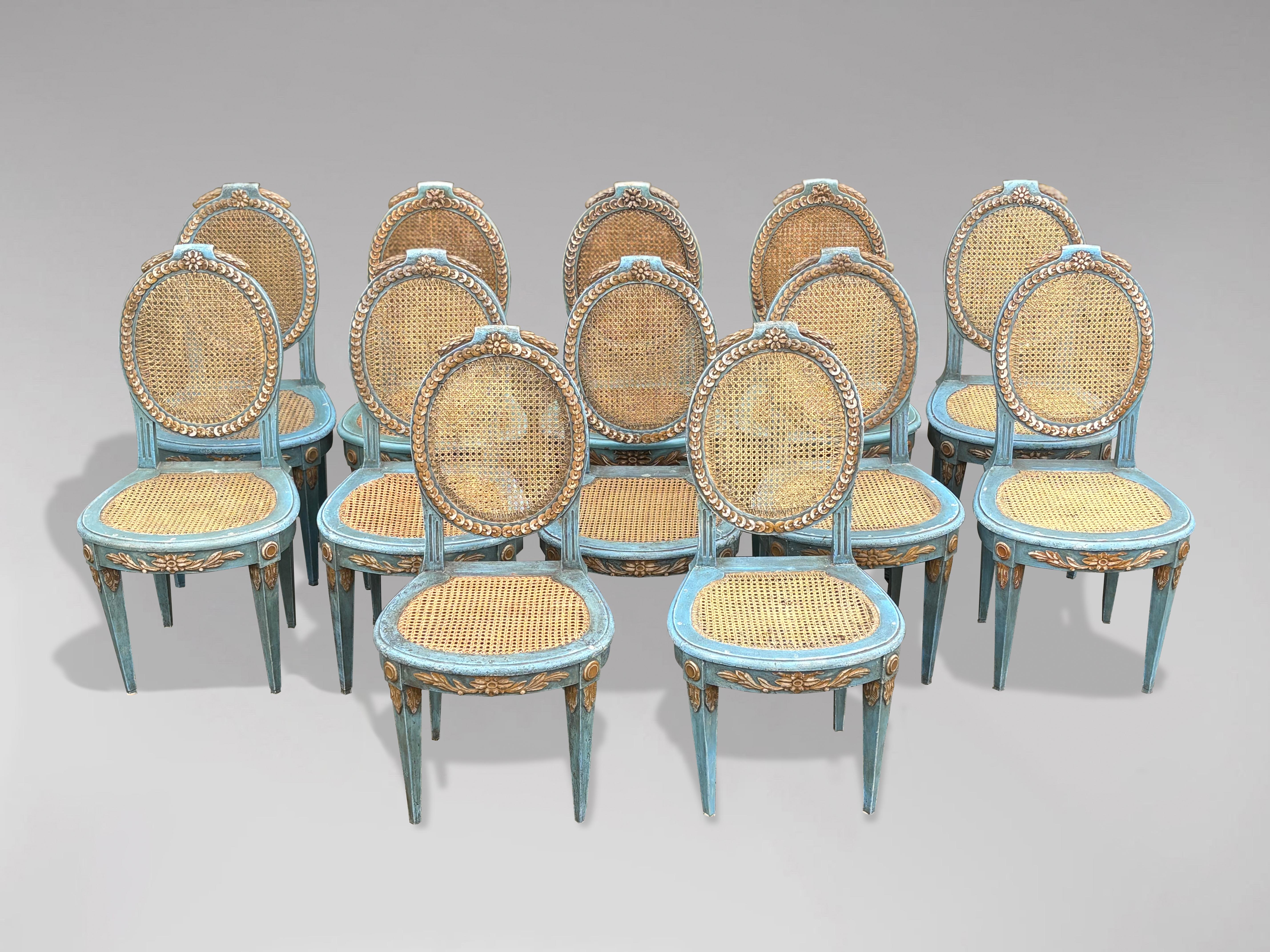 Elegant Set of 12 French Louis XVI Painted & Caned Dining Chairs

A very elegant set of twelve painted and caned dining chairs in the Louis XVI taste, retaining their original blue paint. The chairs are carved and painted wood, with caning to the