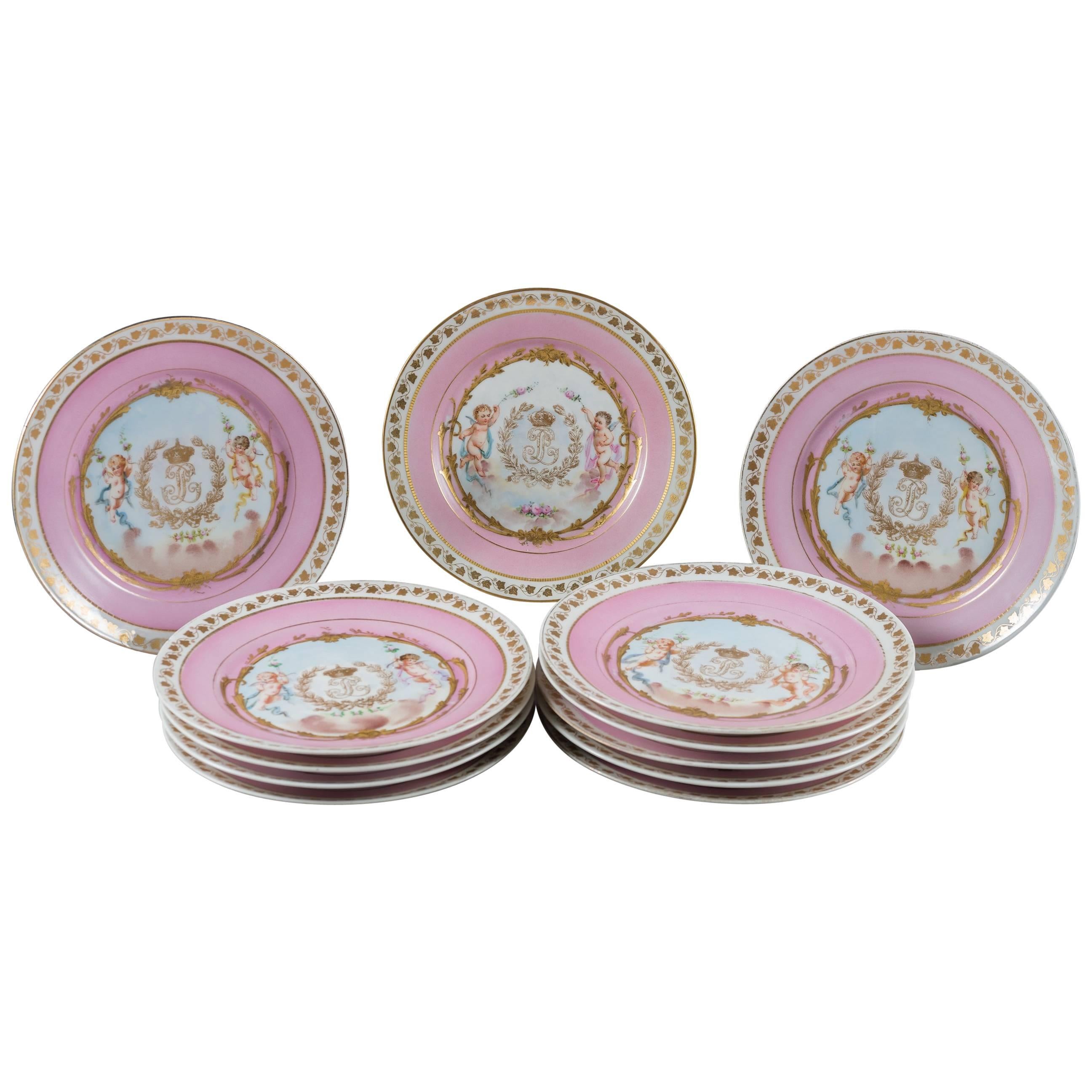 Set of 12 French Sevres Pink Ground Porcelain Painted Plates For Sale