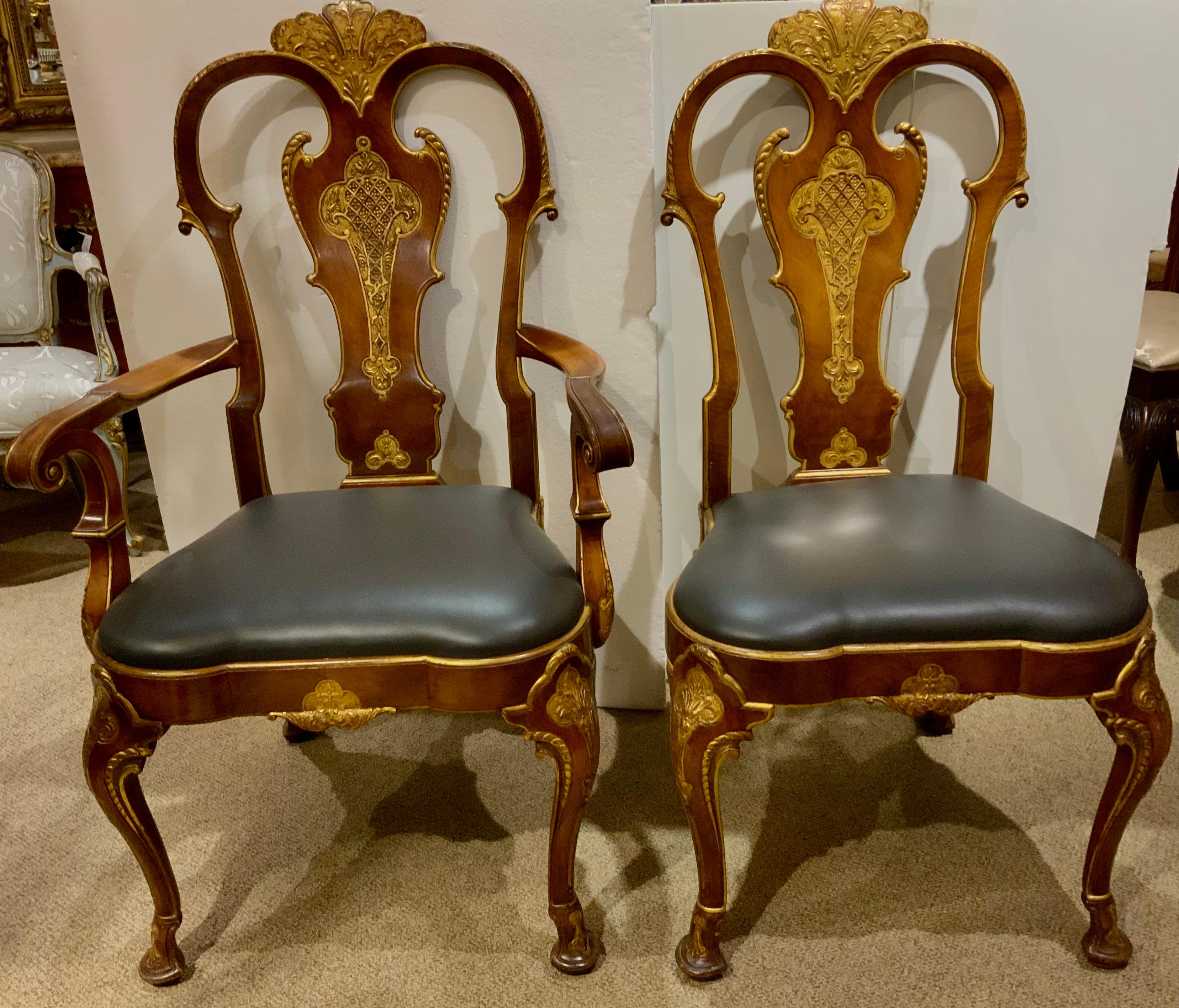 Set of twelve chairs in the George II-Style, the set consisting of two
Arm chairs and ten side chairs, each with a gilt foliate-carved crest above
A shaped splat, the padded seat raised on cabriole legs headed by 
Bellflower carving and ending in
