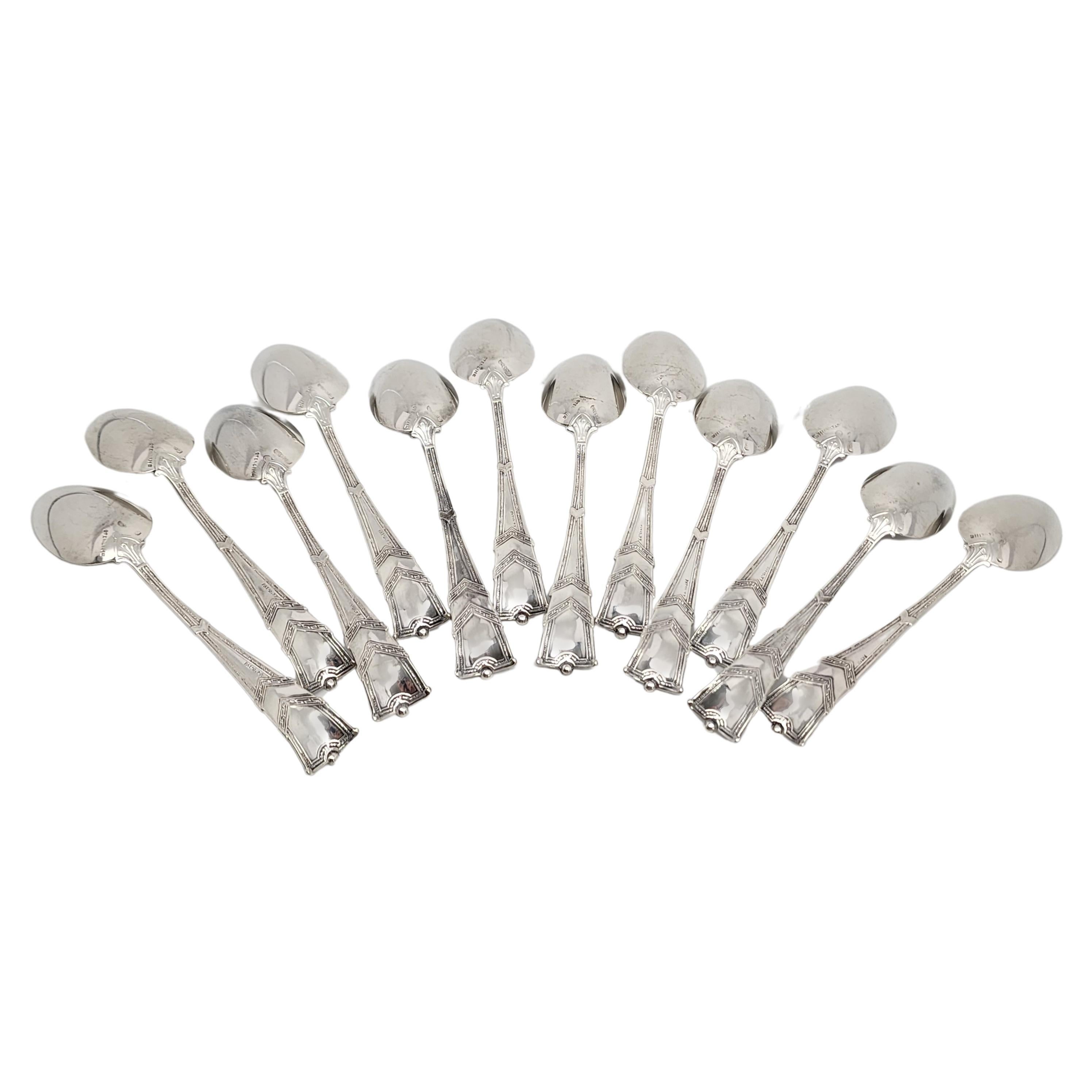Set of 12 antique sterling silver teaspoons by George Shiebler in the Amaryllis pattern, with monogram, circa 1877.

Monogram appears to be JEM

Designed in 1877, the Amaryllis pattern is an intricate and unusual pattern.

Measures approx 5 3/4