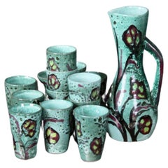 Set of 12 Glass and 1 Pitcher by G. Olivier