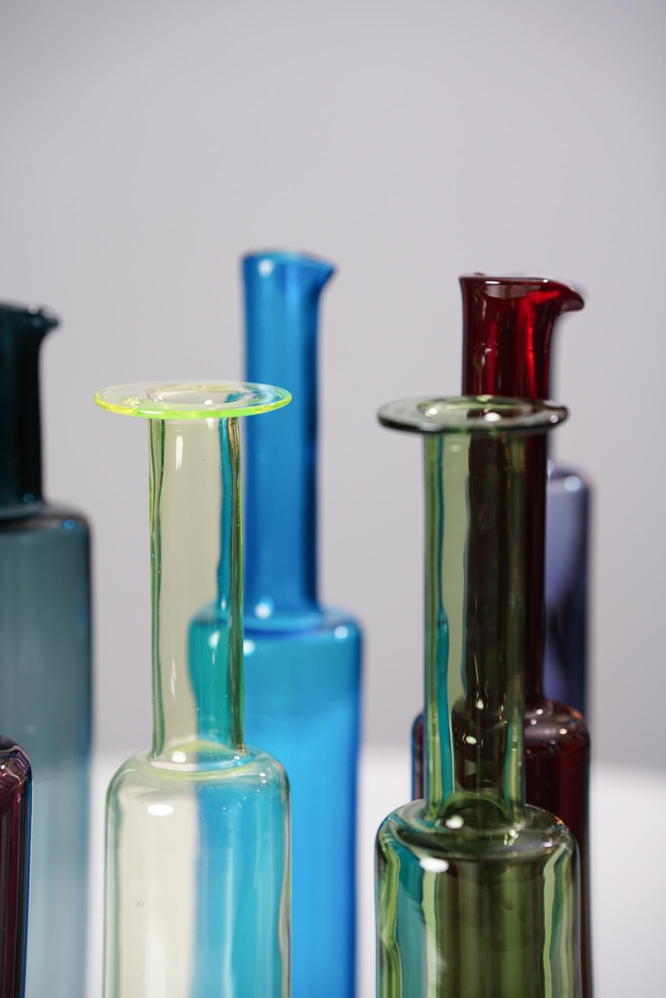 Scandinavian Modern Set of 12 Glass Bottles by Nanny Still for Riihimäen Lasi, 1960s For Sale
