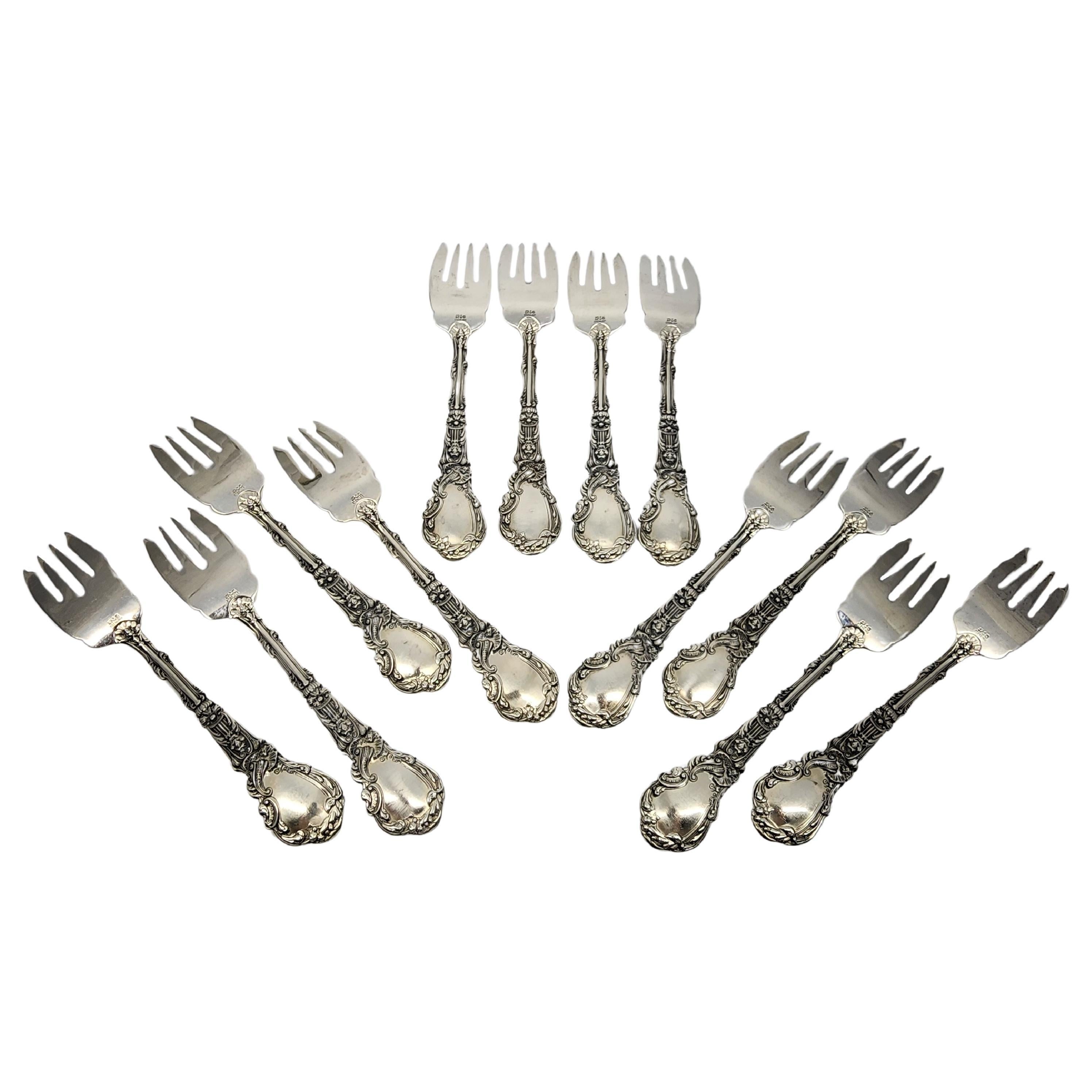 Set of 12 sterling silver salad forks by Gorham in the Versailles pattern.

No monogram.

Gorham's Versailles is a multi motif pattern designed by Antoine Heller in 1885. Named for the Palace of Versailles, the pattern depicts ornate scenes of